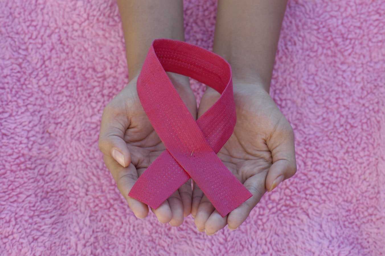 The pink ribbon of breast cancer awareness. | Source: Unsplash