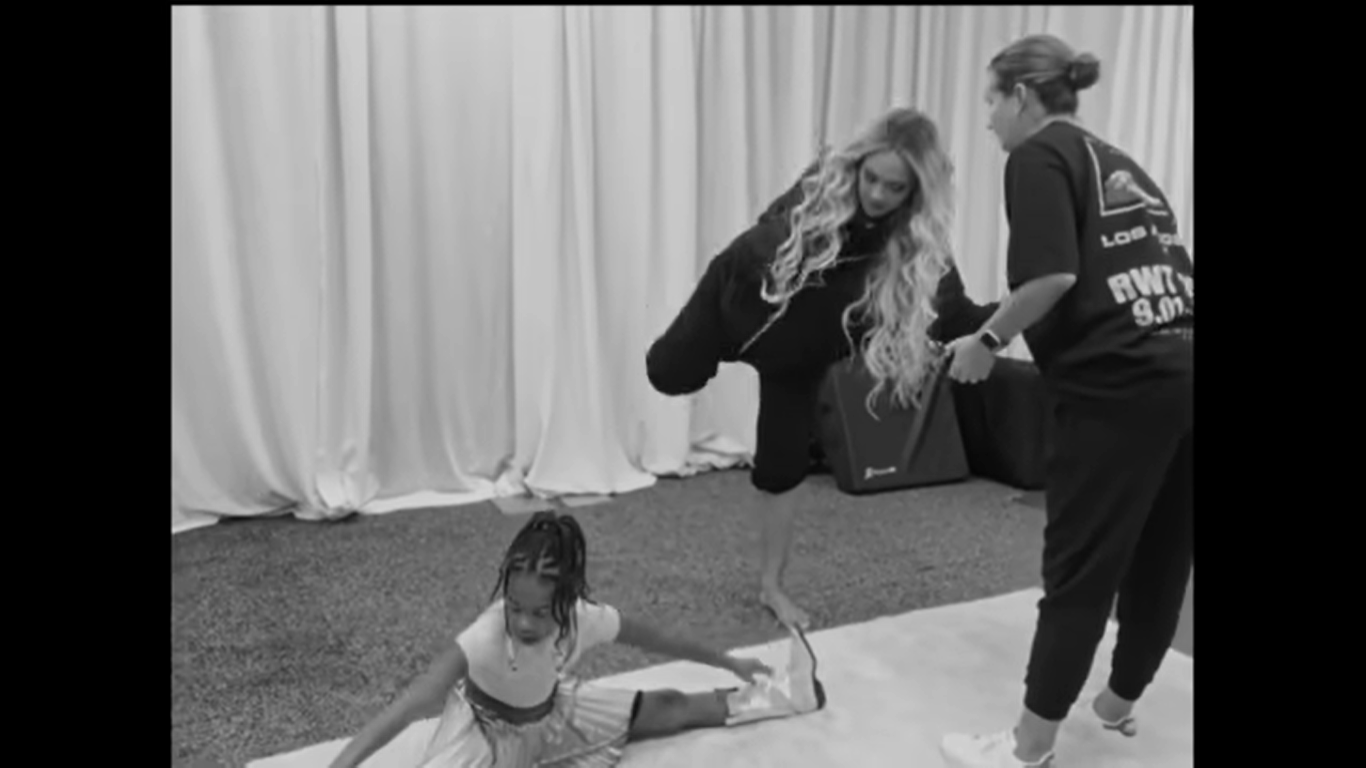 Beyonce and Rumi Carter stretching their legs | Source: YouTube/Beyonce