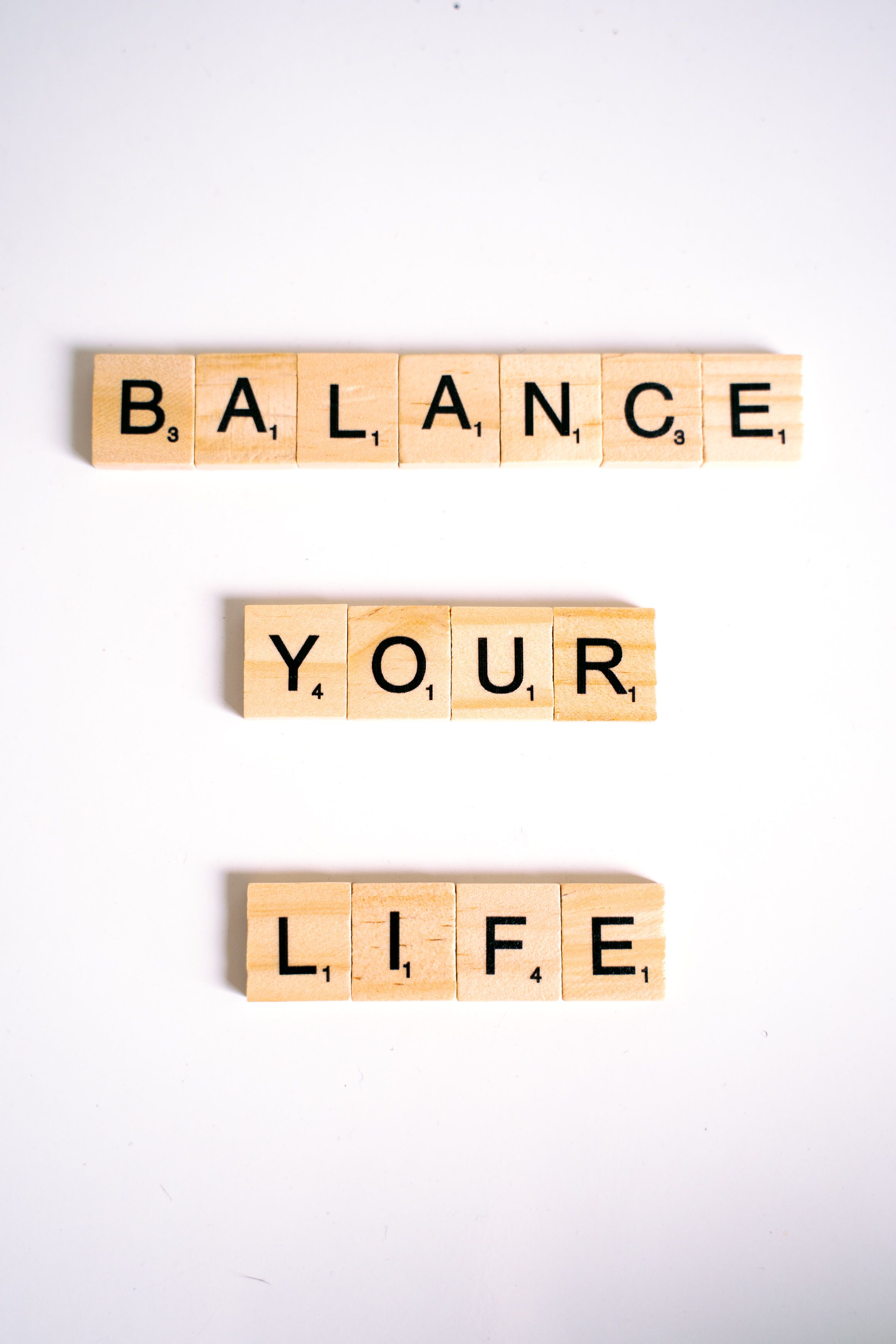 Tiles forming the words: Balance Your Life | Source: Pexels