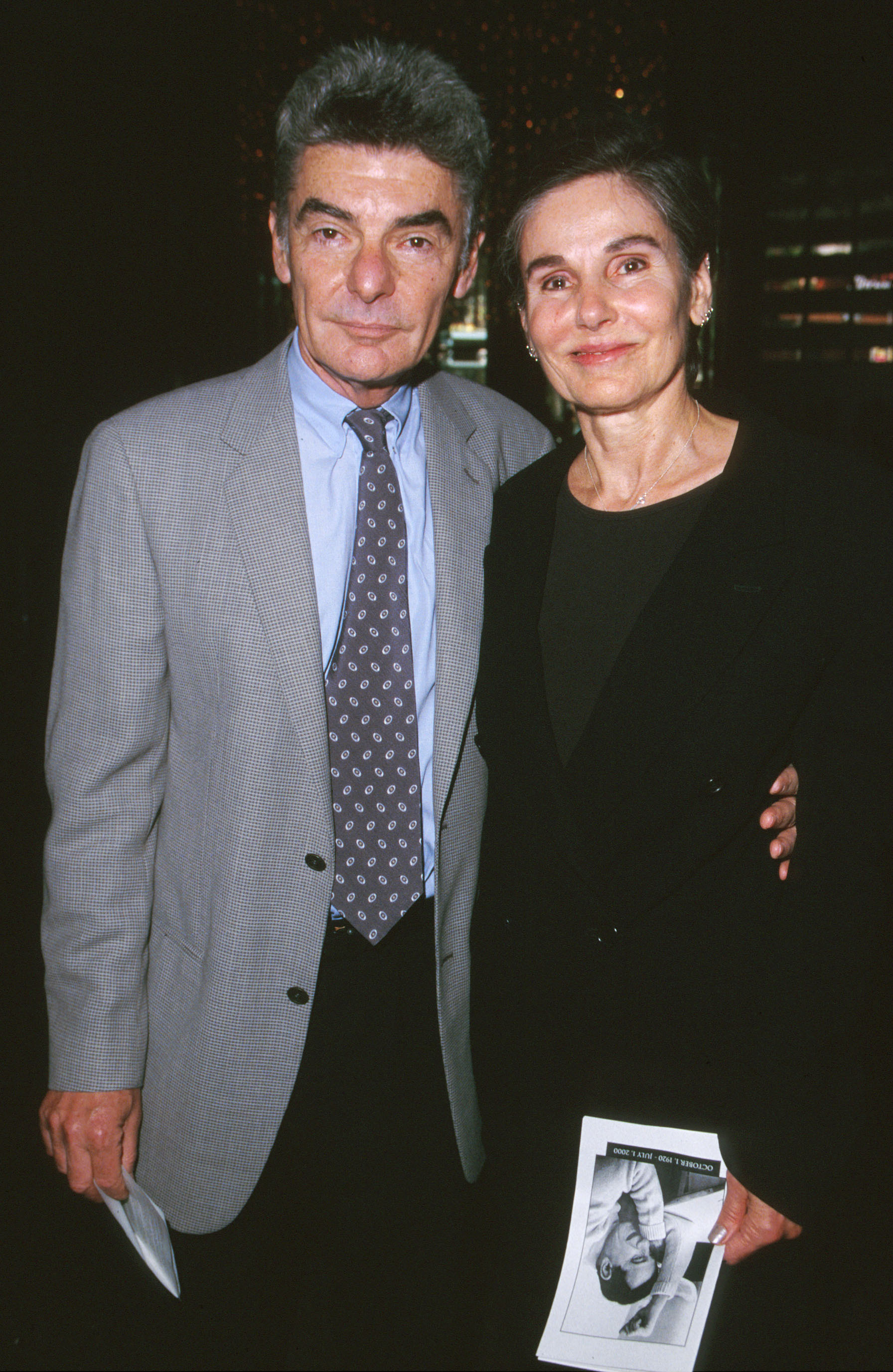 The same day, they were photographed holding memorial programs at the Directors Guild of America Theatre during the service