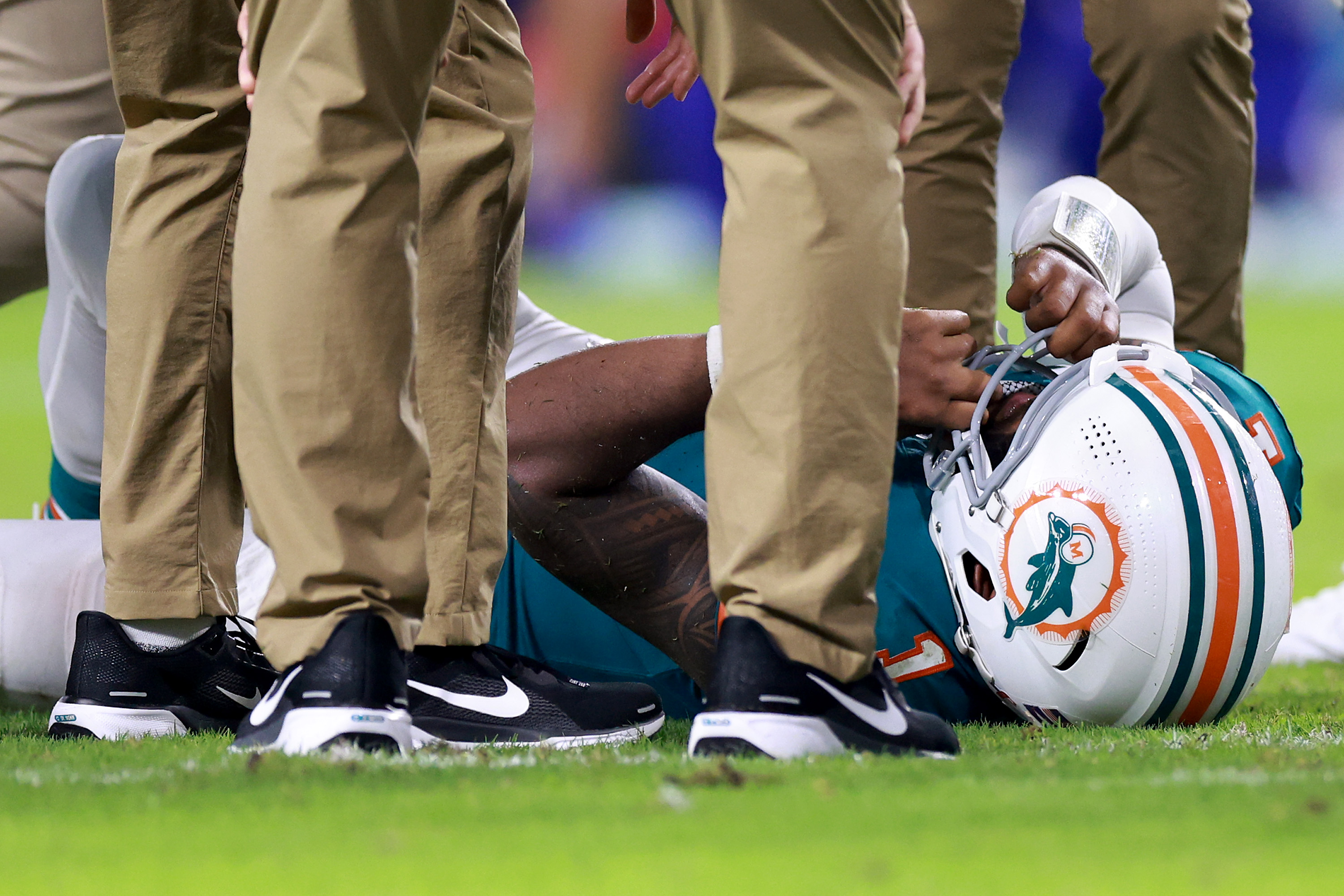 Tua Tagovailoa lying on the ground after colliding with Damar Hamlin during the third quarter in the game at Hard Rock Stadium on September 12, 2024, in Miami Gardens, Florida. | Source: Getty Images