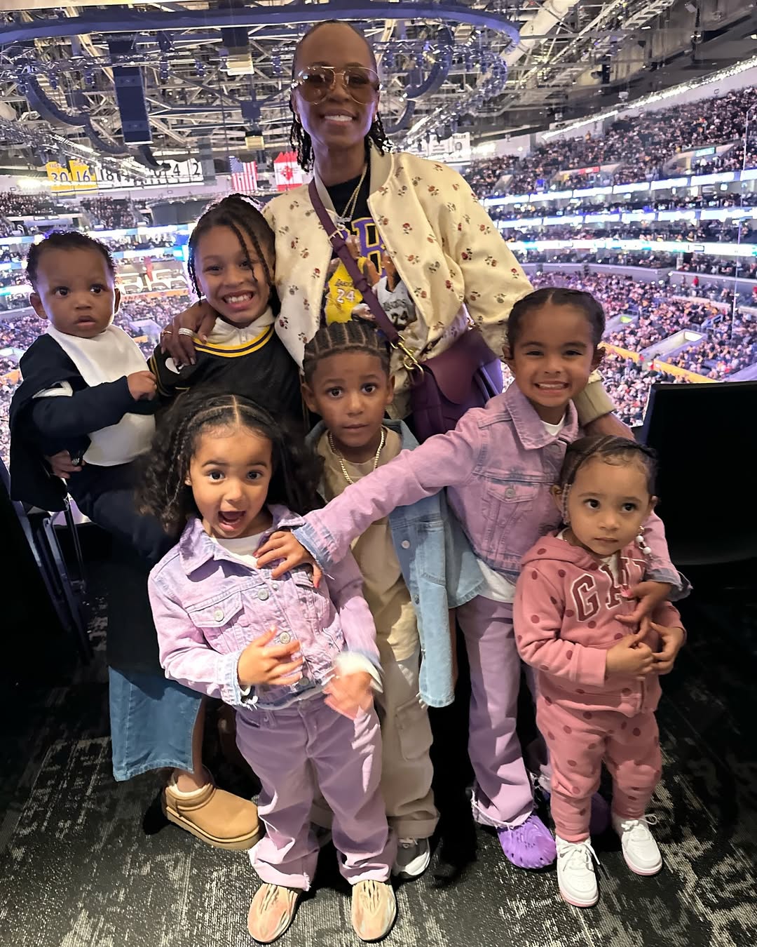 Shante Broadus posing with her grandchildren, dated May 2024 | Source: Instagram/bosslady_ent