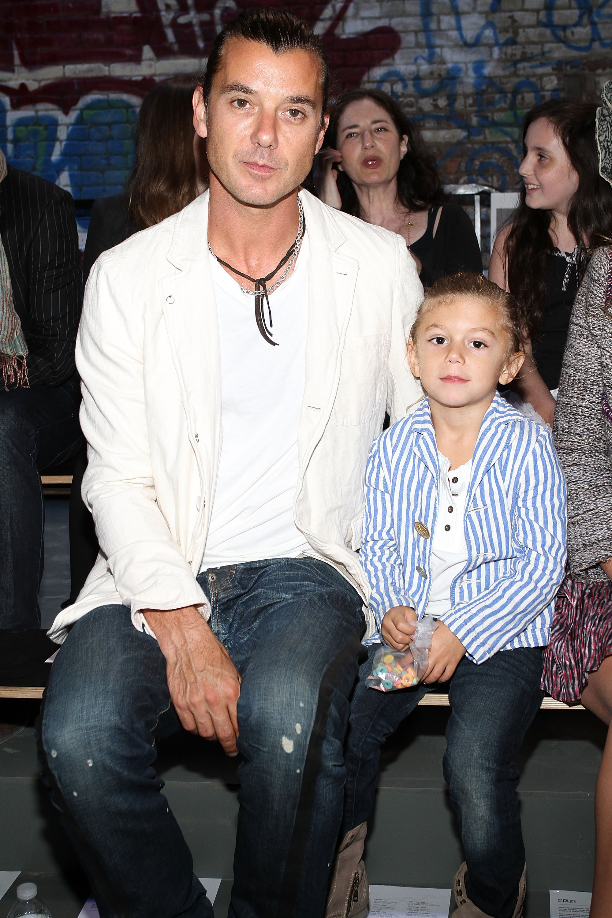 Gavin and Kingston Rossdale at the Edun Spring 2011 fashion show in New York City on September 11, 2010 | Source: Getty Images