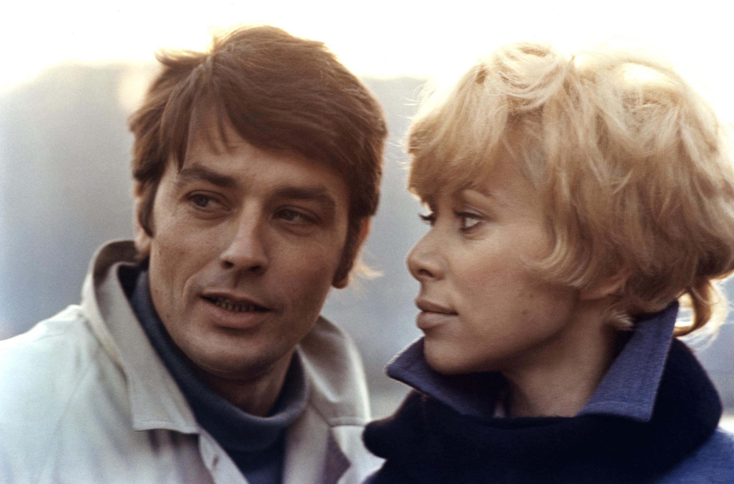 Alain Delon and Mireille Darc on the set of "Jeff," directed by Jean Herman in 1969. | Source: Getty Images