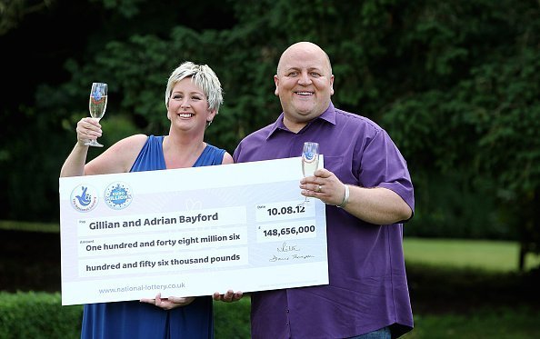 Adrian Bayford, 41, and wife Gillian, 40, from Haverhill, Suffolk, after a press conference at Down Hall Country House Hotel in Hatfield Heath | Photo: Getty Images