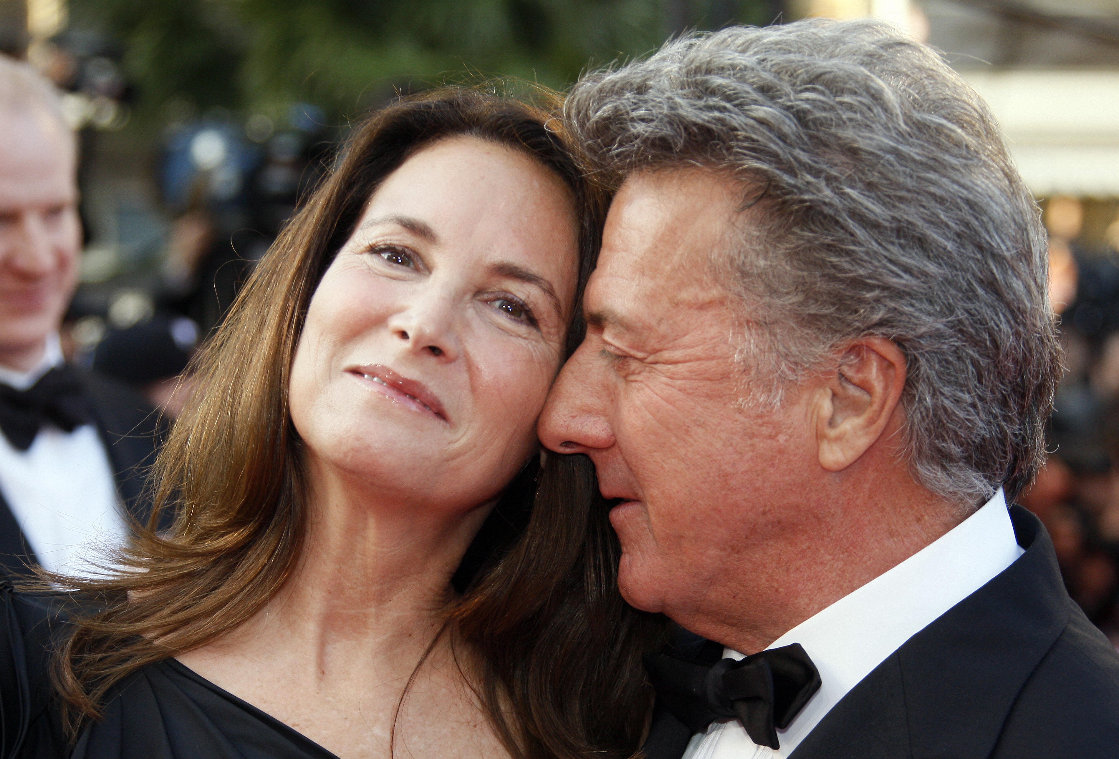 Dustin Hoffman and his wife Lisa Gottsegen pose as they arrive to attend the screening of animated film 