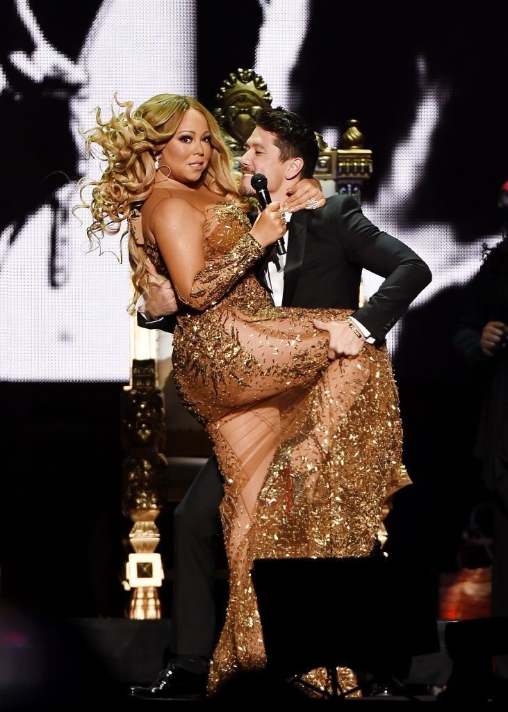 Mariah Carey and Bryan Tanaka perform in New York. | Source: Getty Images