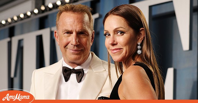 A photograph  of Kevin Costner with Christine Baumgartner. | Source: Getty Images