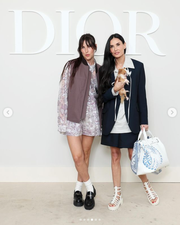 Scott LaRue Willis and Demi Moore strike serious poses at the Dior Homme show during Paris Fashion Week on June 21, 2024. | Source: Instagram/demimoore