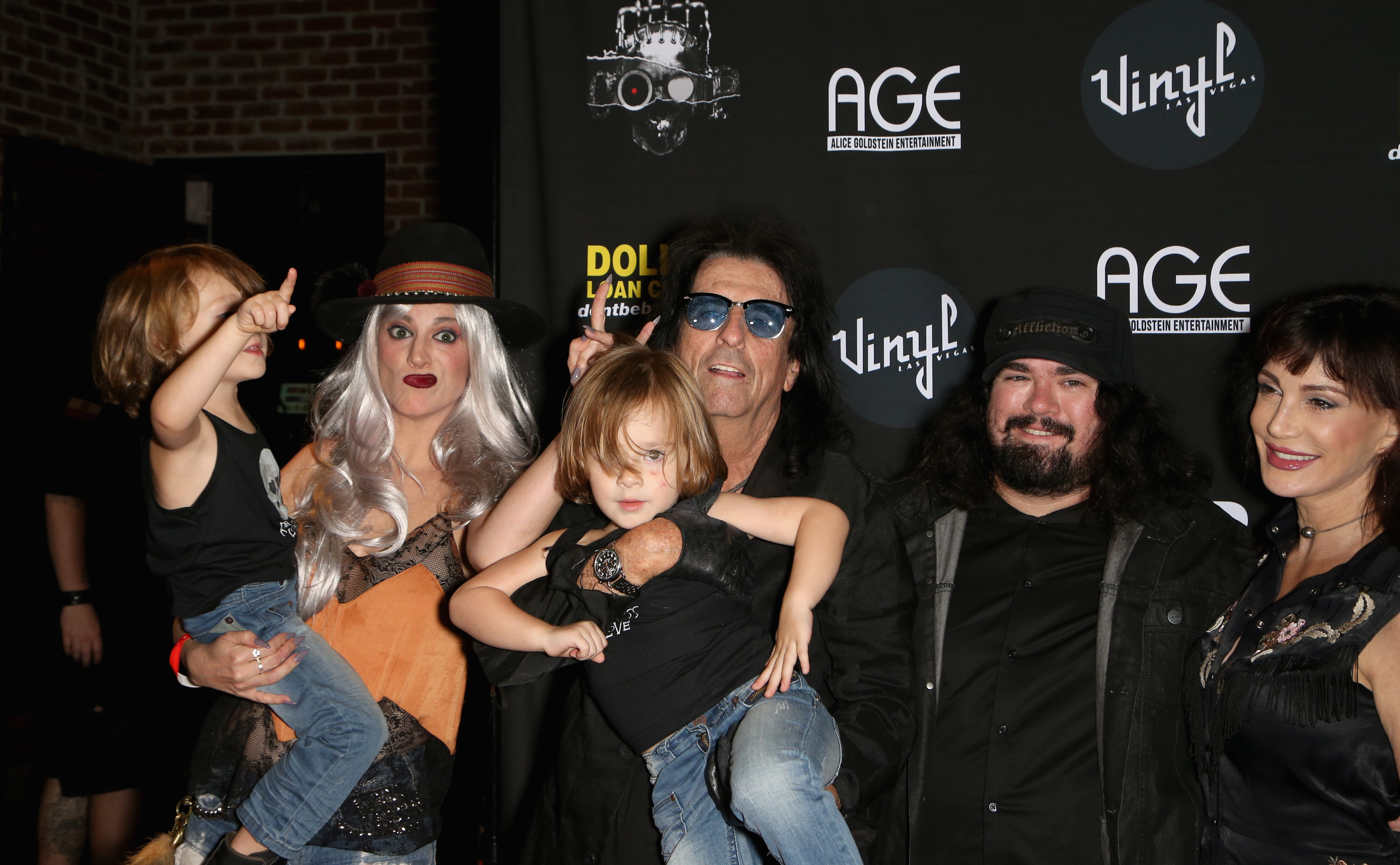 (L-R) Falcon Cooper, Calico Cooper, Riot Cooper, Alice Cooper, Dash Cooper, and Sheryl Cooper attend a CD release party for CO-OP at Vinyl inside the Hard Rock Hotel & Casino, on August 9, 2018, in Las Vegas, Nevada.| Source: Getty Images