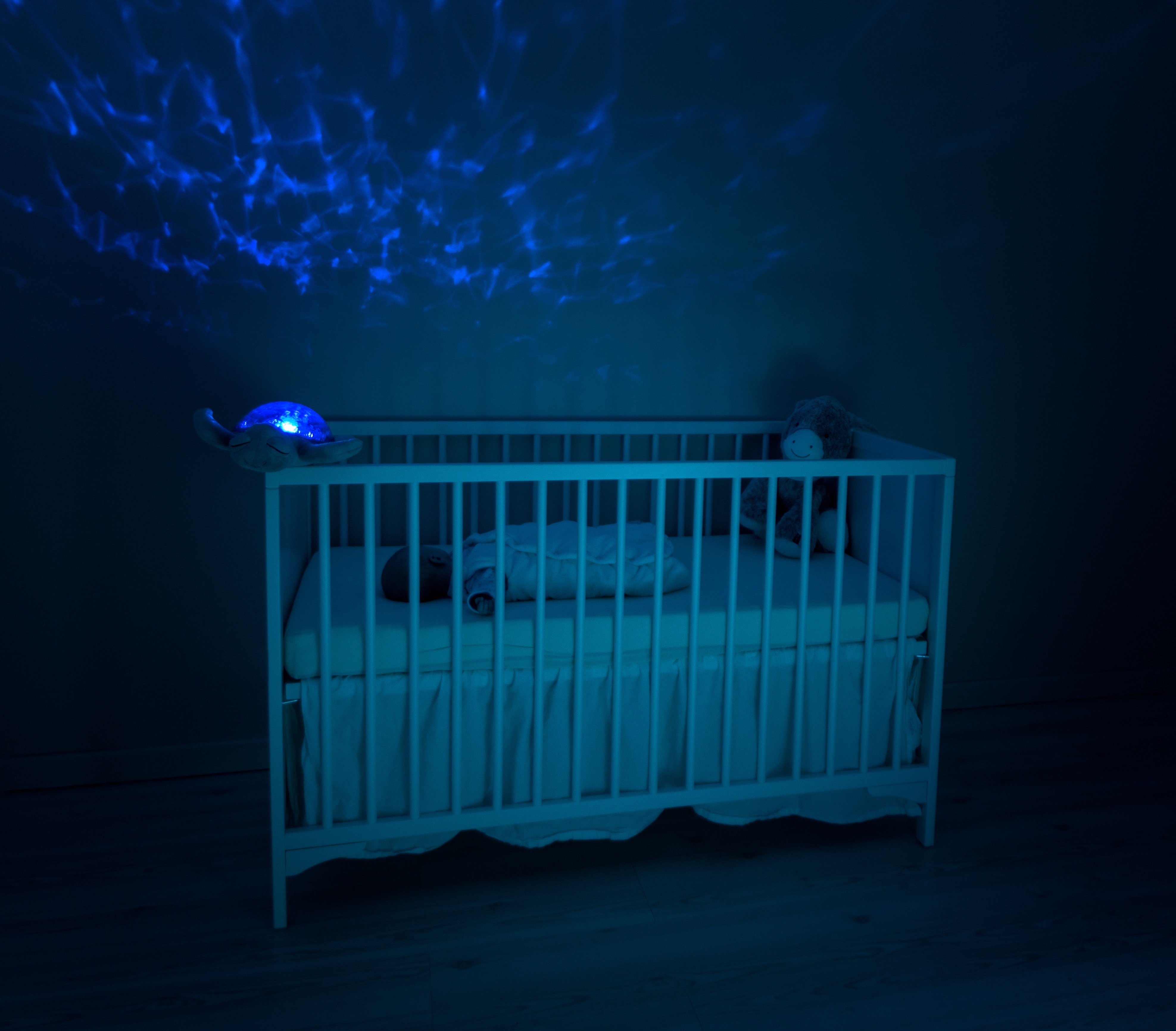 A baby sleeping in a crib. | Source: Unsplash
