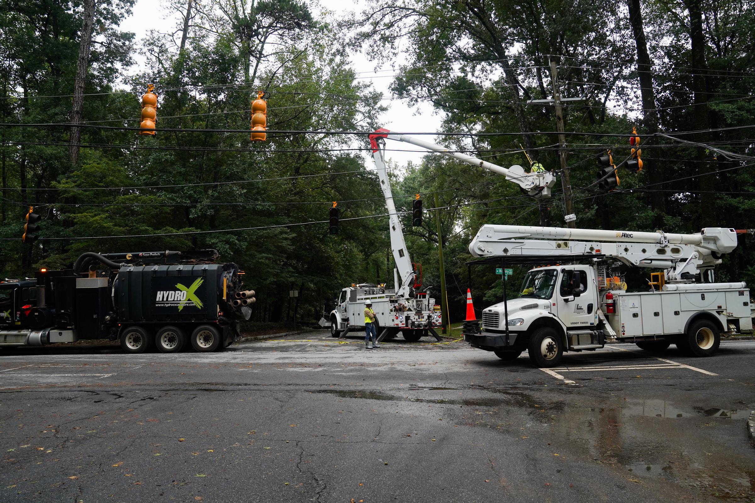 A tree and power line lay across a road in Buckhead after hurricane Helene brought in heavy rains overnight in Atlanta, Georgia, on September 27, 2024 | Source: Getty Images