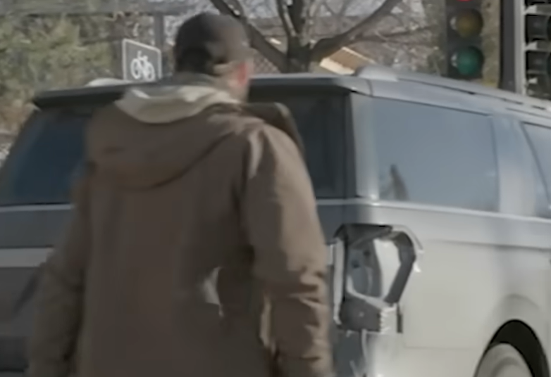 The man kicking a federal agent's vehicle, as seen in a video posted on January 29, 2026 | Source: YouTube/ABC7