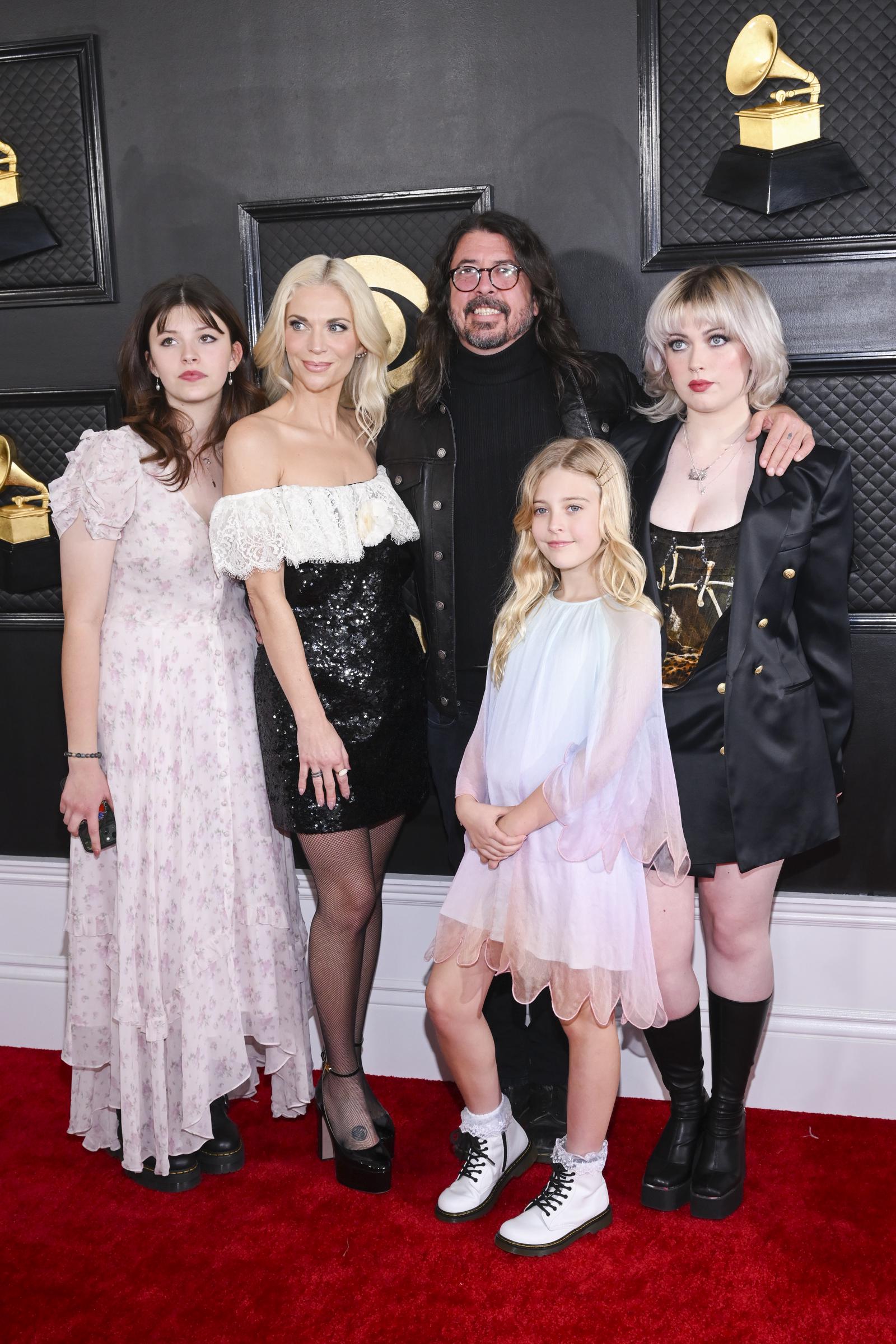 Violet Grohl, Jordyn Blum, Dave Grohl, Ophelia Grohl and Harper Grohl at the 65th Annual Grammy Awards on February 5, 2023, in Los Angeles, California. | Source: Getty Images