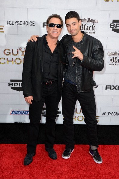 Actor Jean-Claude Van Damme (L) and his son Kristopher Van Varenberg arrive at Spike TV's 6th Annual "Guys Choice Awards" at Sony Pictures Studios on June 2, 2012, in Culver City, California. | Source: Getty Images.