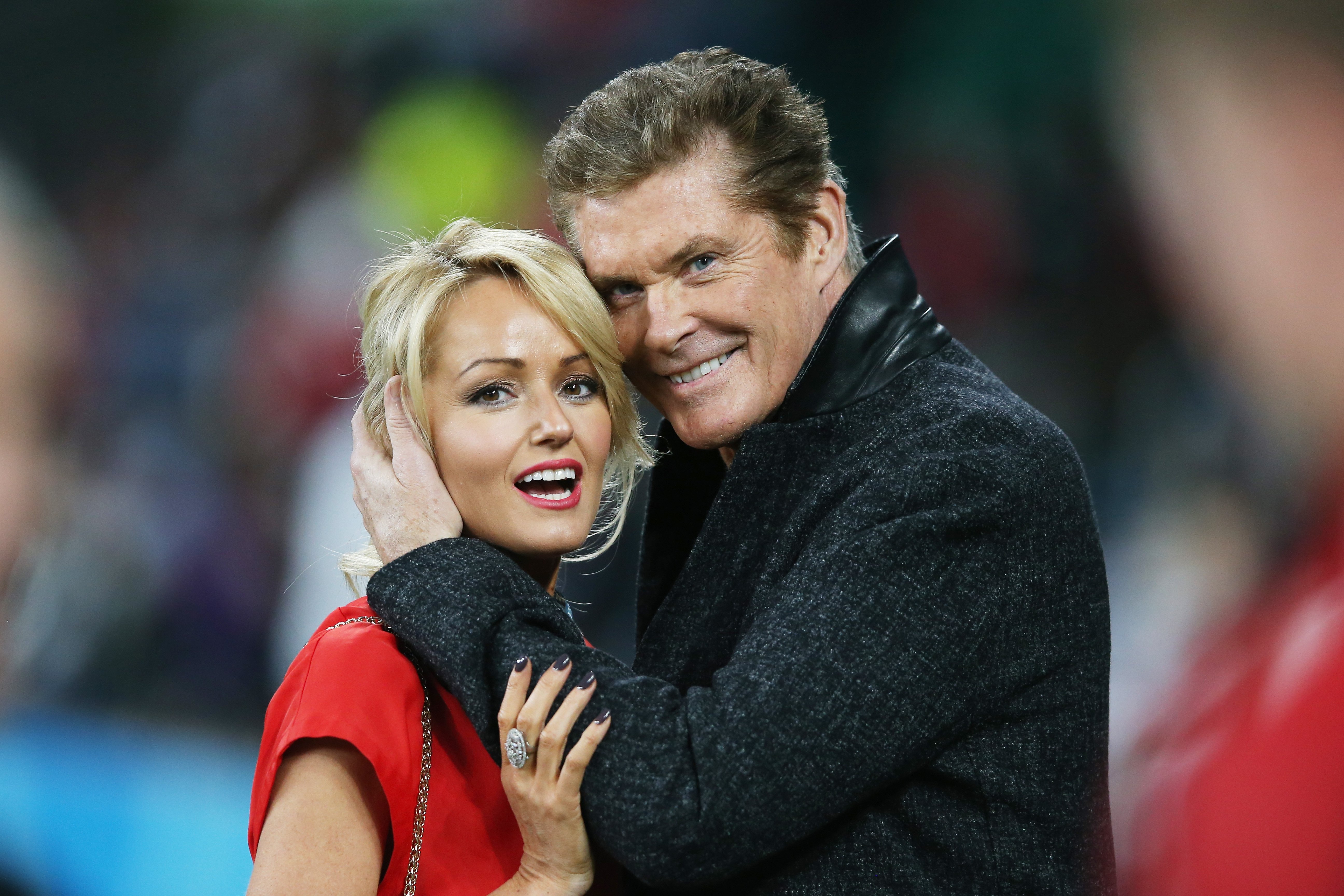 David Hasselhoff hugs welsh girlfriend Hayley Roberts during the 2015 Rugby World Cup Pool A match between England and Wales at Twickenham Stadium on September 26, 2015, in London, United Kingdom. | Source: Getty Images.