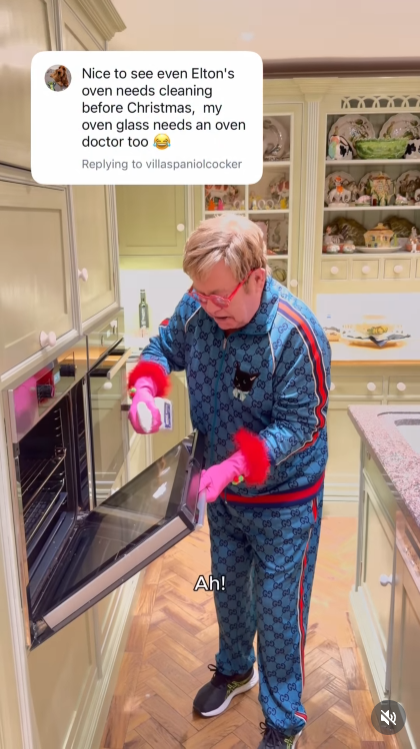With a sharp "Ah!" of determination, John spritzes the oven door like a man on a mission — proving that if fans want spotless, he'll give them spectacularly spotless. | Source: Instagram/eltonjohn