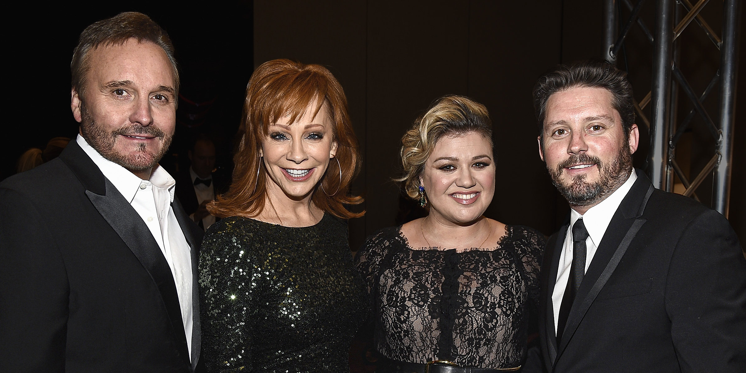 Narvel Blackstock, Reba McEntire, Kelly Clarkson, and Brandon Blackstock, 2015 | Source: Getty Images