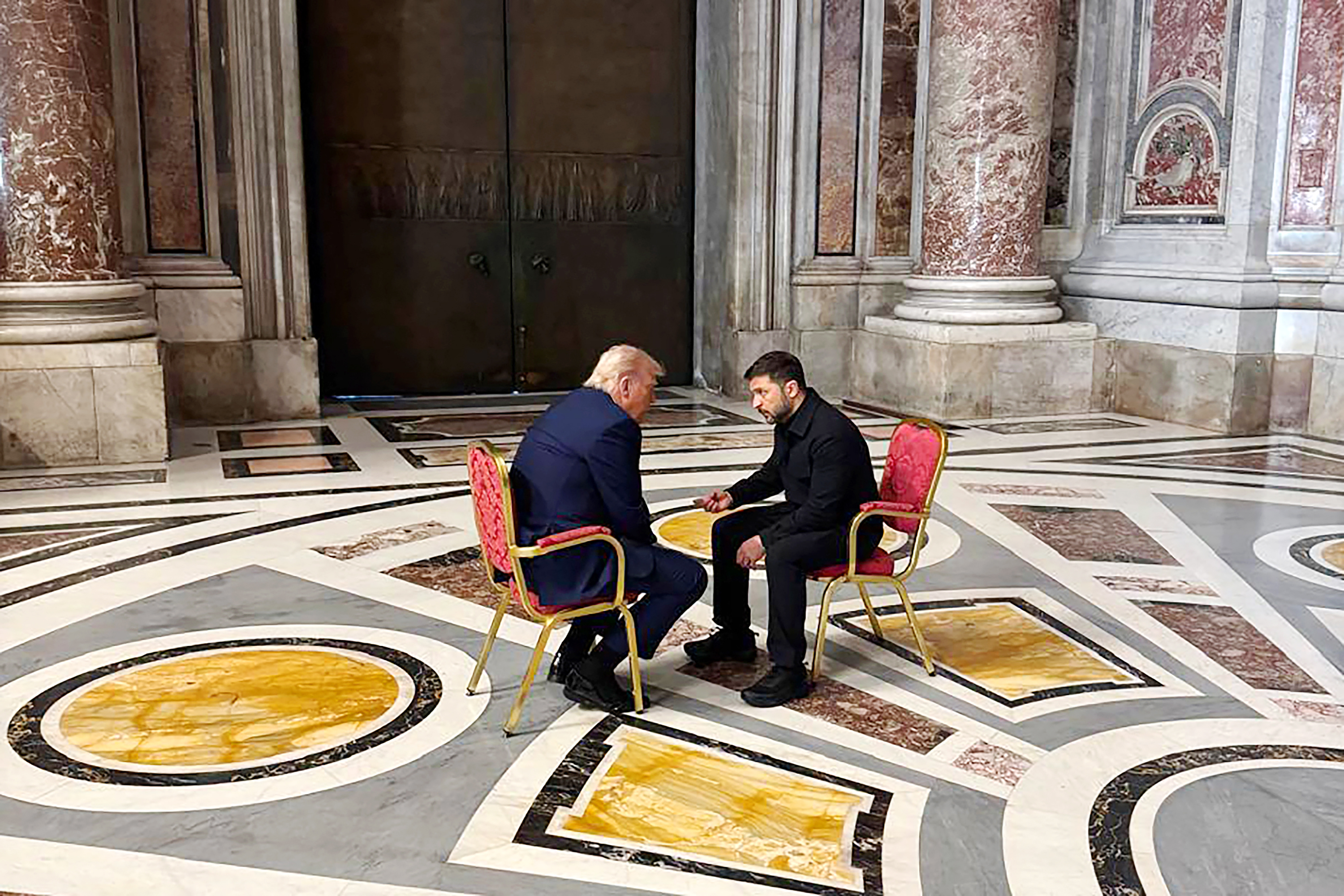 Donald Trump and Volodymyr Zelenskyy engaged in a discussion. | Source: Getty Images