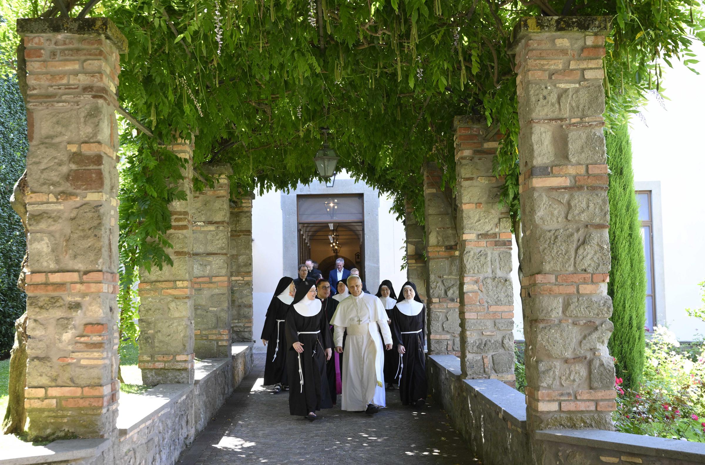 Pope Leo XIV pictured with nuns at the Immaculate Conception Convent of the Poor Clares on July 15, 2025, in Albano Laziale, Italy. | Source: Getty Images