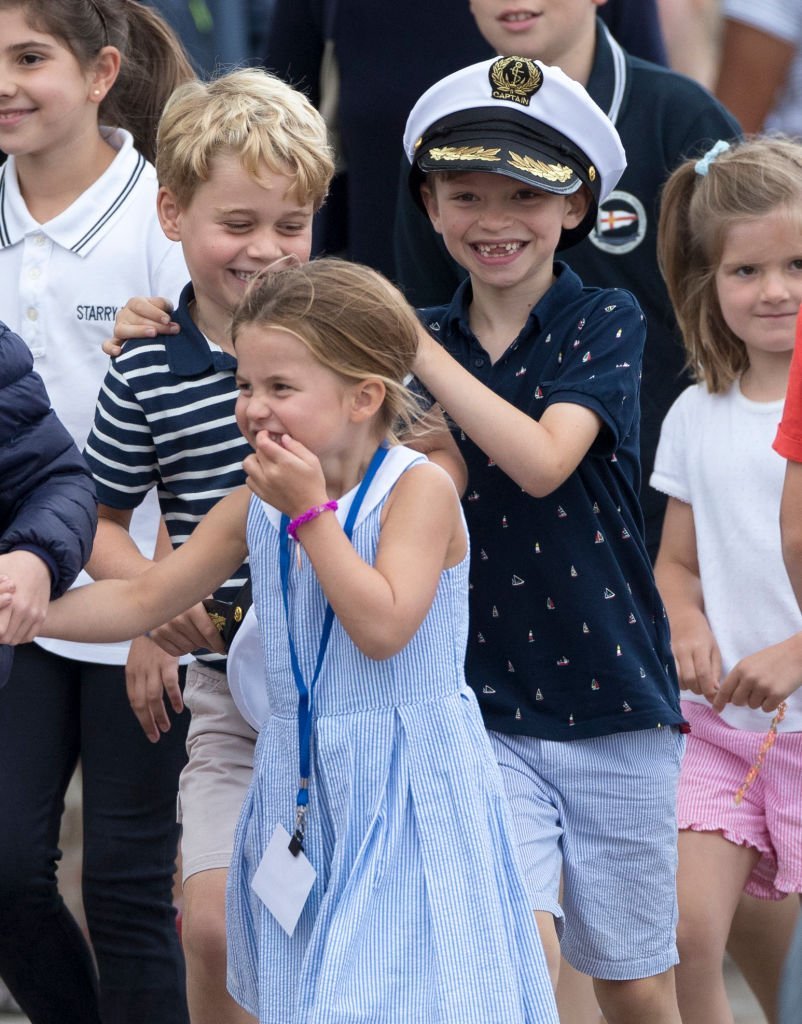 Prince George with Princess Charlotte at The Royal Yacht Squadron during the inaugural Kings Cup regatta | Photo: Getty Images