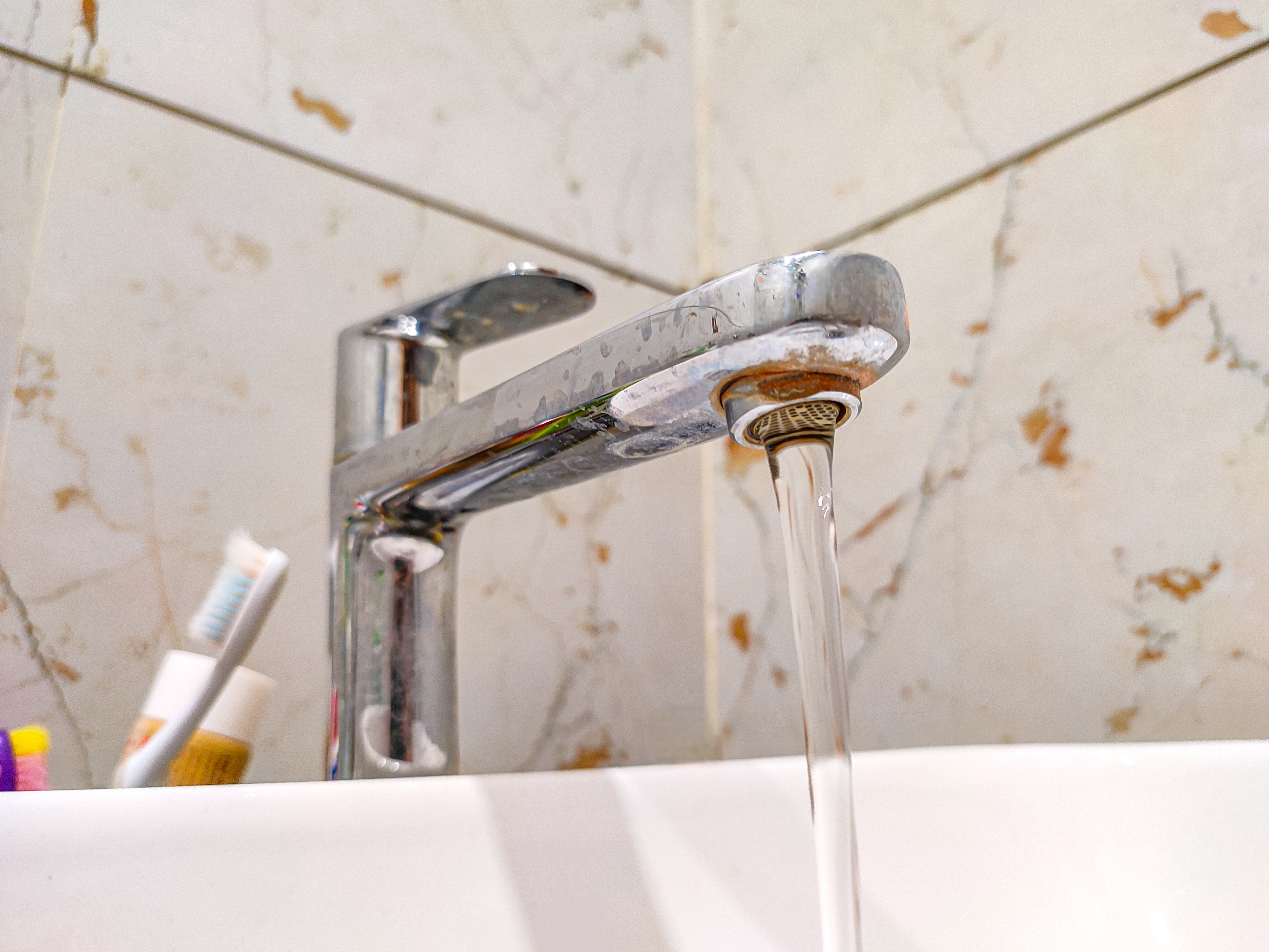 Water running from the faucet | Source: Getty Images