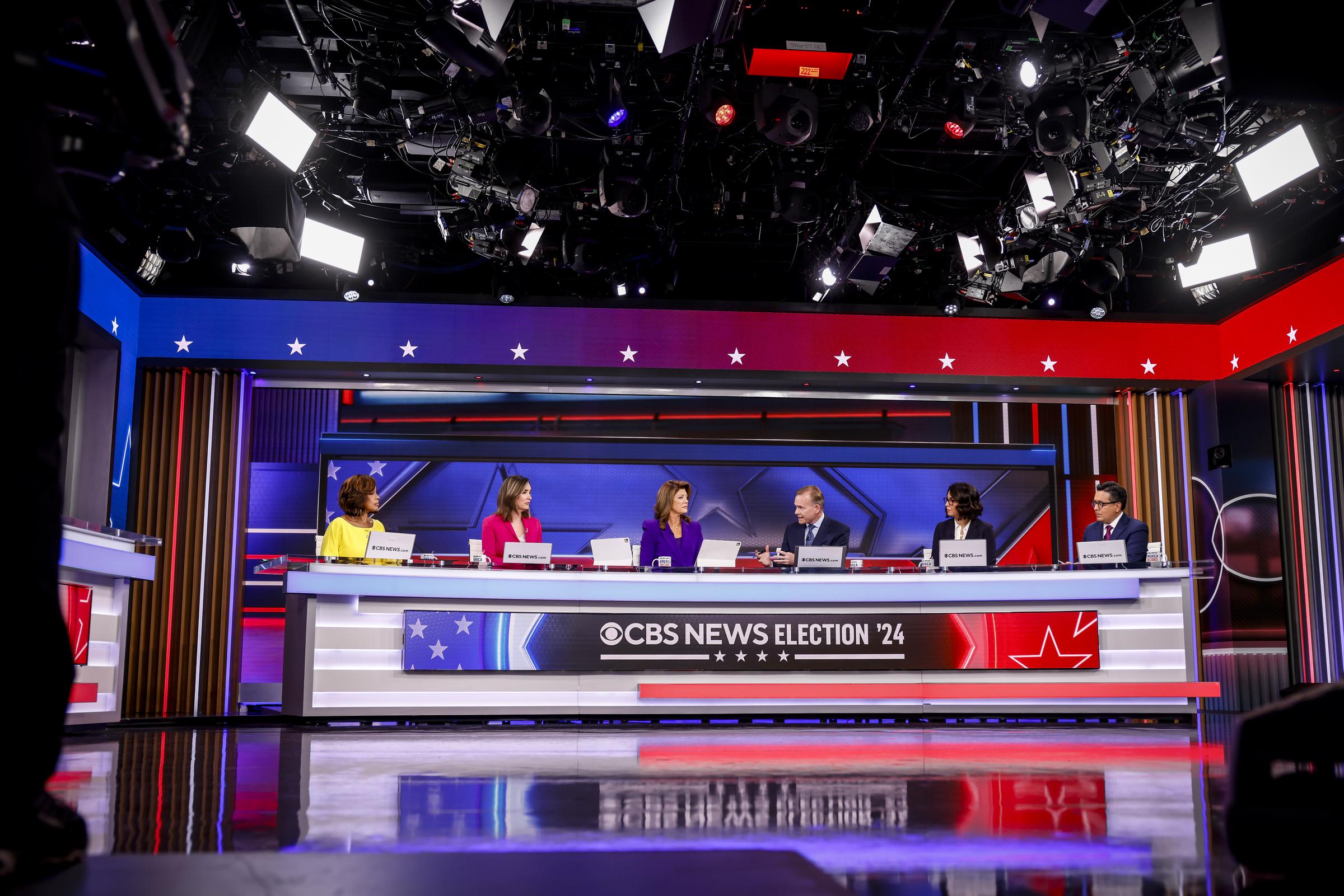 Gayle King, Margaret Brennan, Norah O'Donnell, John Dickerson, Cecilia Vega, and Ed O'Keefe from CBS News covering the election in New York City on November 5, 2024. | Source: Getty Images