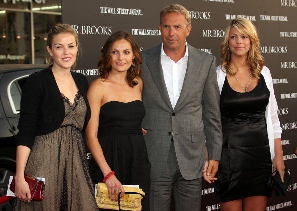 Costner, Baumgartner, and his daughters Lily and Annie at Grauman's Chinese Theater on May 22, 2007 in Los Angeles, California | Source: Getty Images