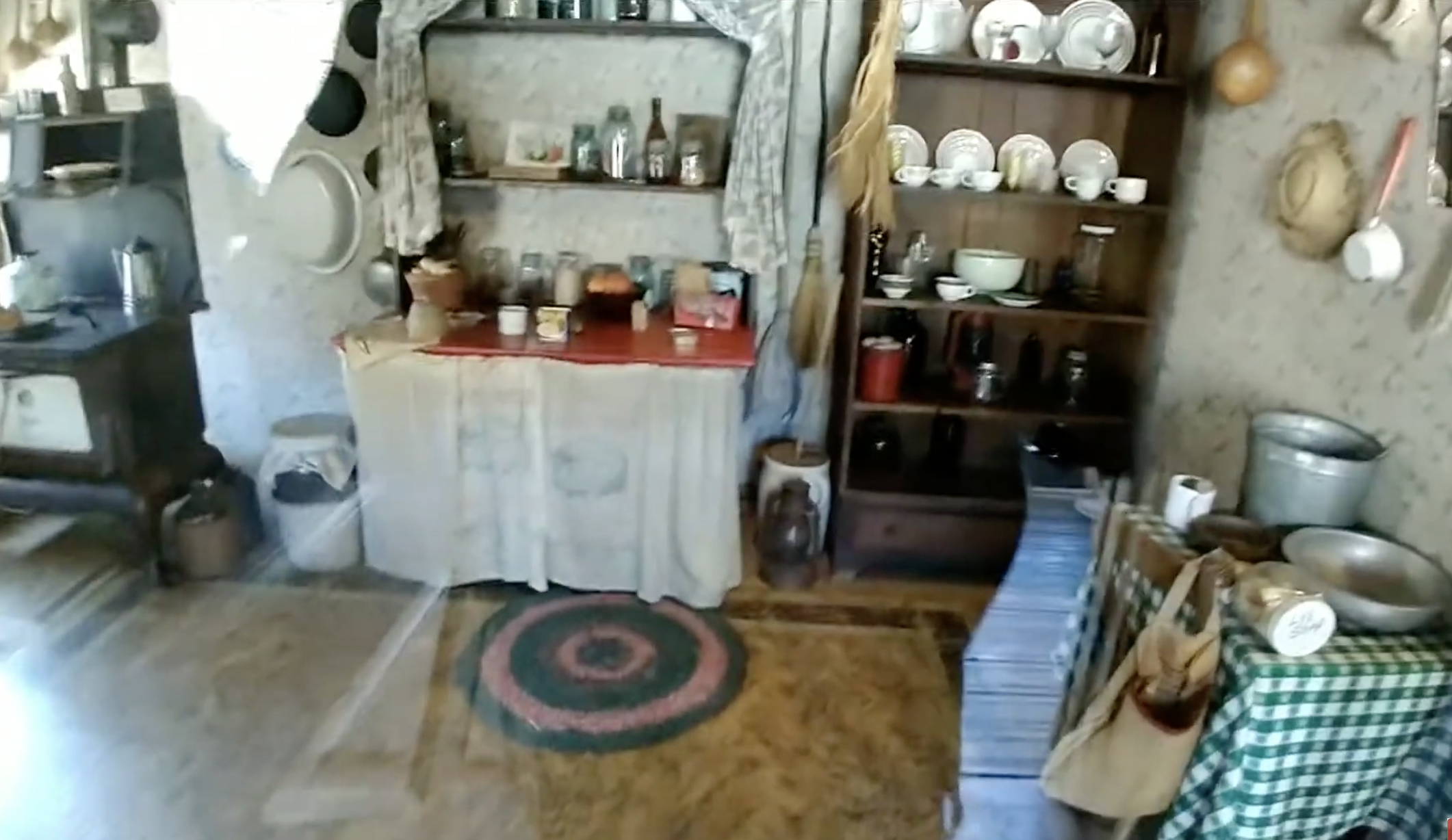 The kitchen of the log cabin | Source: YouTube/@OurShowOurStory