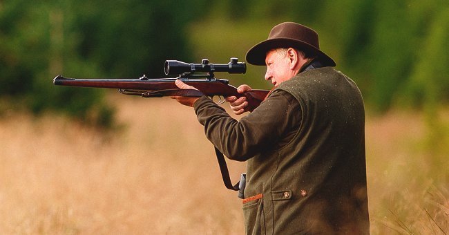 Old man shooting at a duck | Photo: Shutterstock