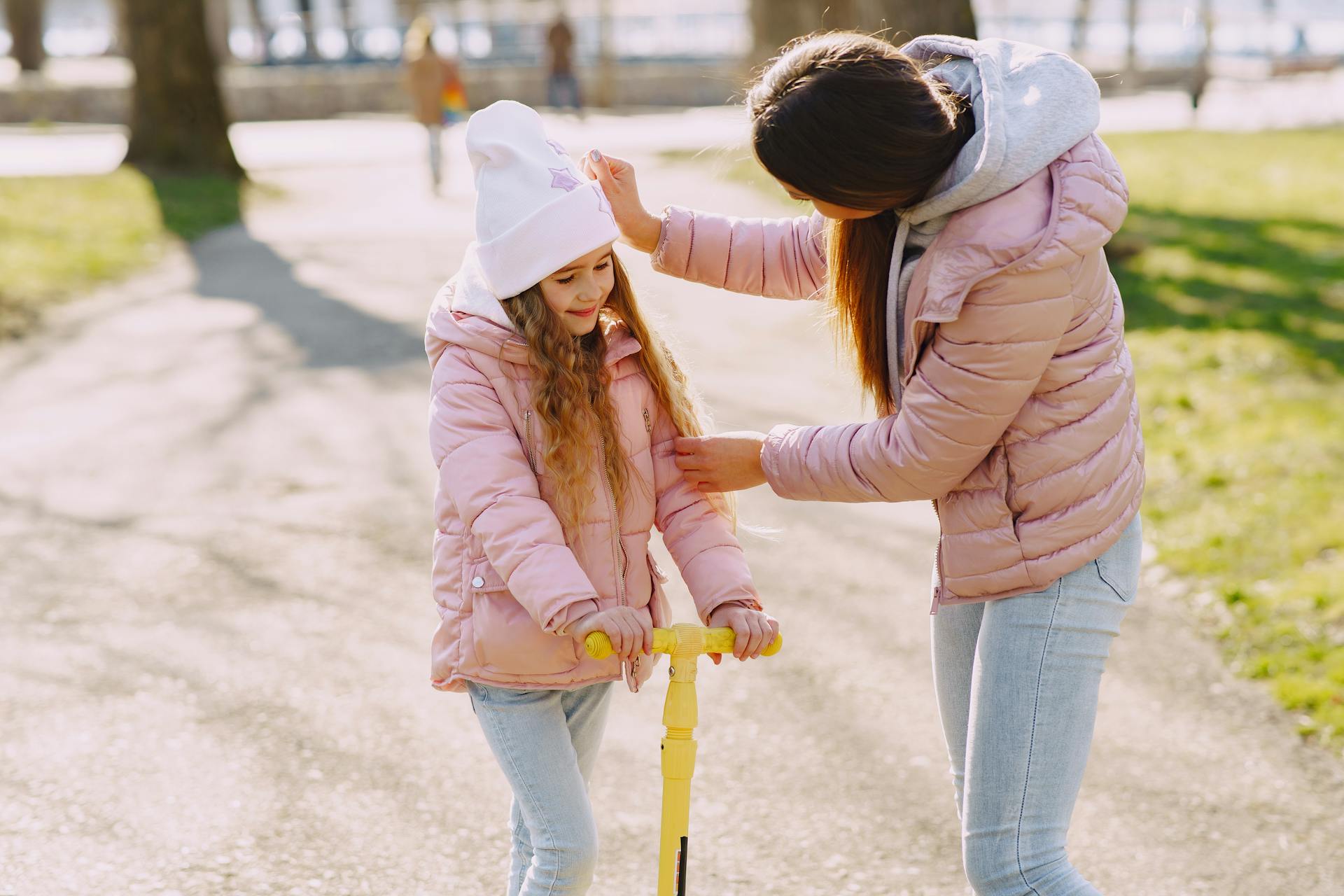 A woman talking to her daughter in a park | Source: Pexels