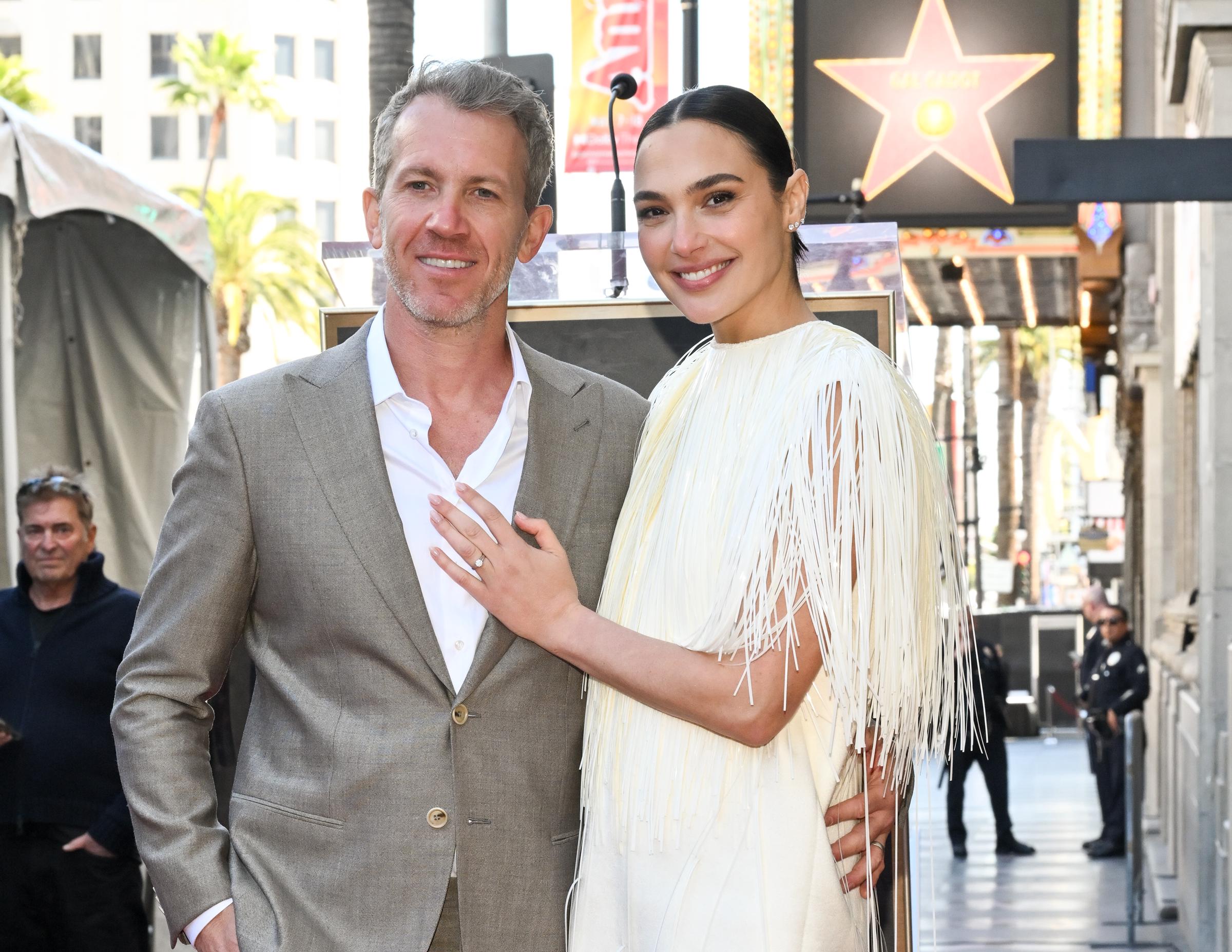 Gal Gadot is seen with her husband Jaron Varsano at the ceremony honoring her with a Star on the Hollywood Walk Of Fame on March 18, 2025, in Hollywood, California | Source: Getty Images