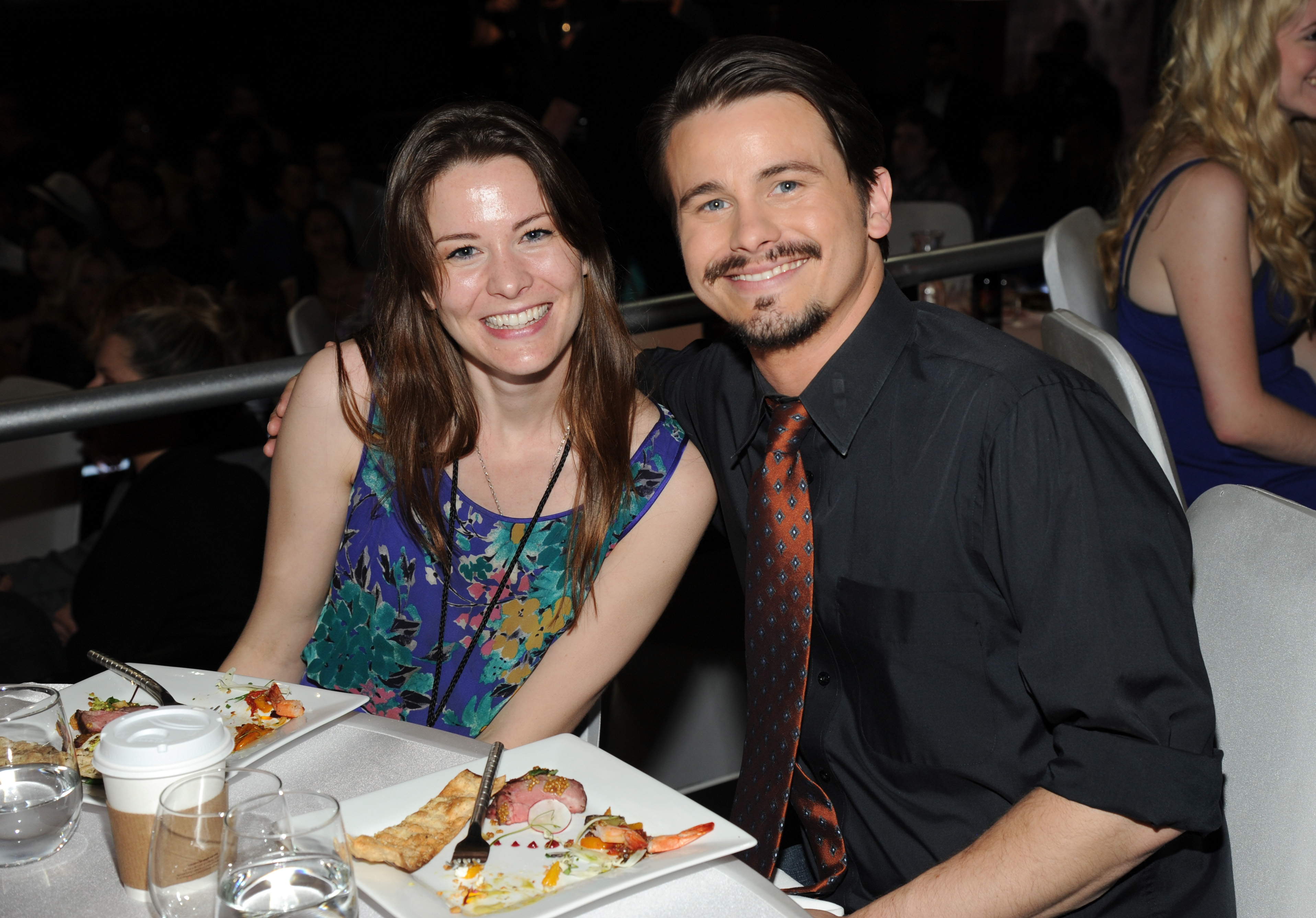 Carly Ritter (L) and her brother actor Jason Ritter in the audience at the 2014 iHeartRadio Music Awards held at The Shrine Auditorium on May 1, 2014 in Los Angeles, California. | Source: Getty Images