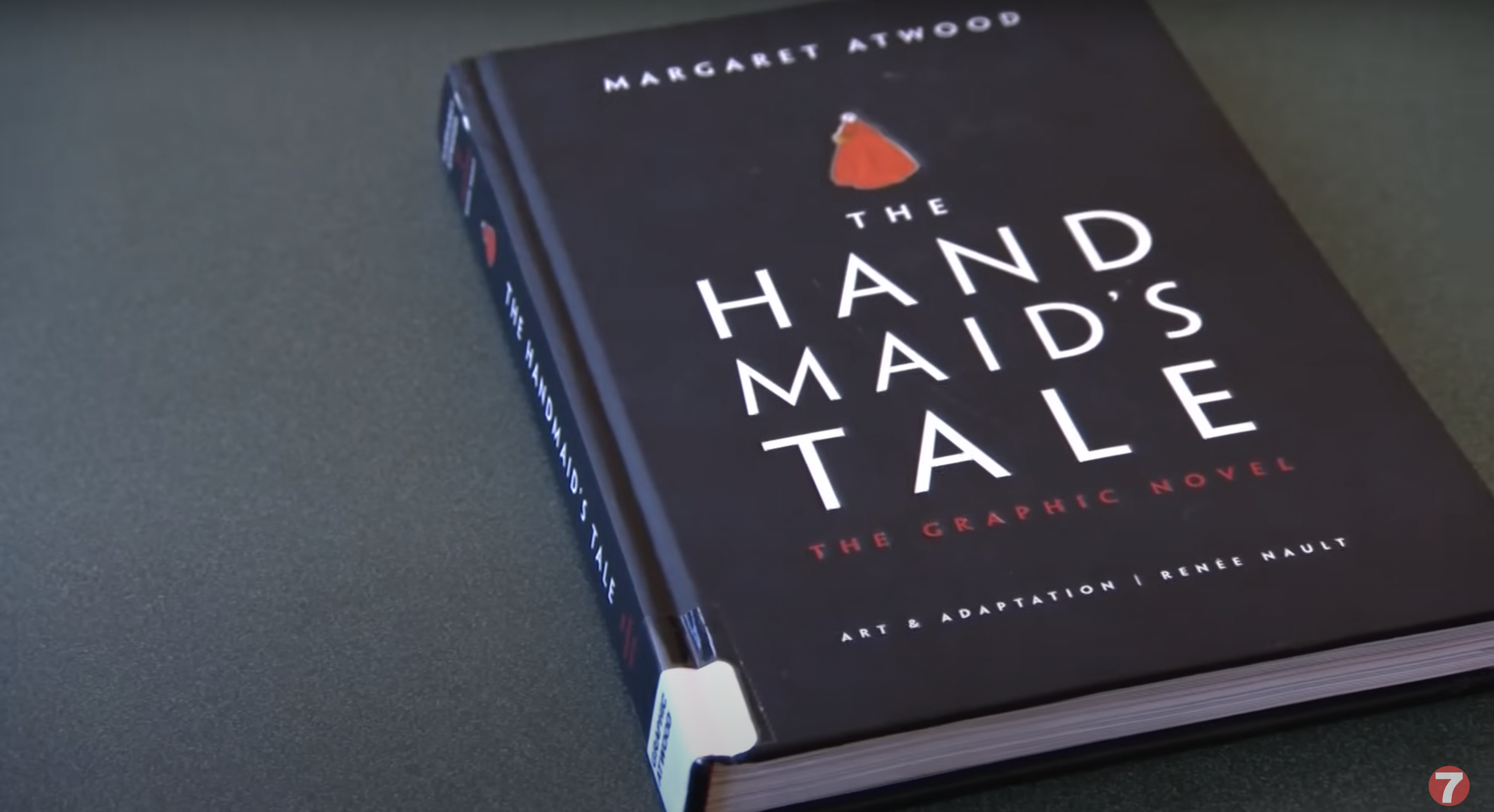 The graphic novel adaptation of Margaret Atwood's "The Handmaid's Tale," as seen in a video posted May 29, 2024 | Source: YouTube/ktvb7