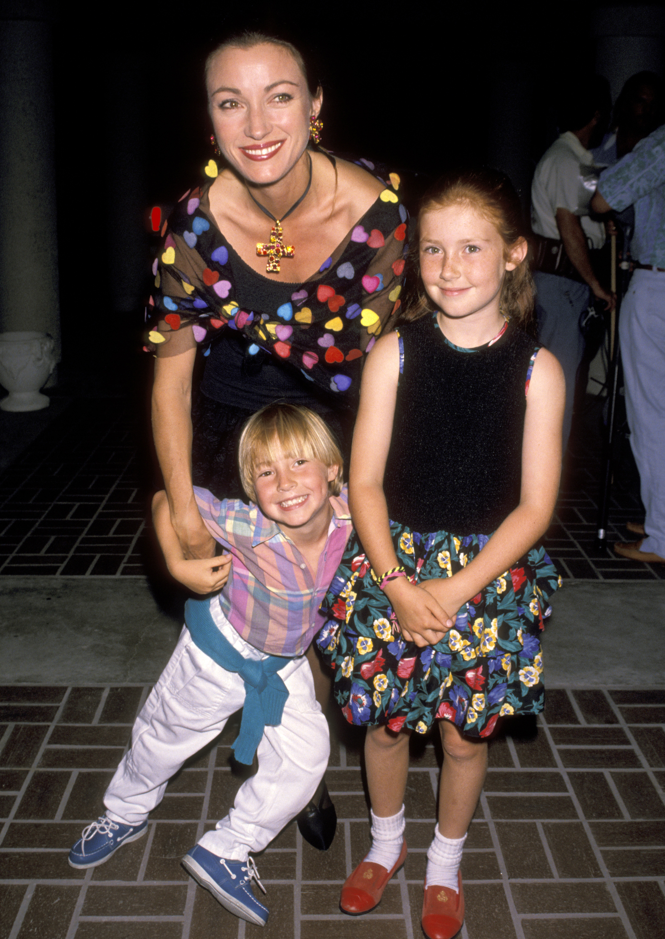 Jane Seymour photographed with her son Sean Flynn and daughter Katherine Flynn at a party on  June 6, 1990. | Source: Getty Images