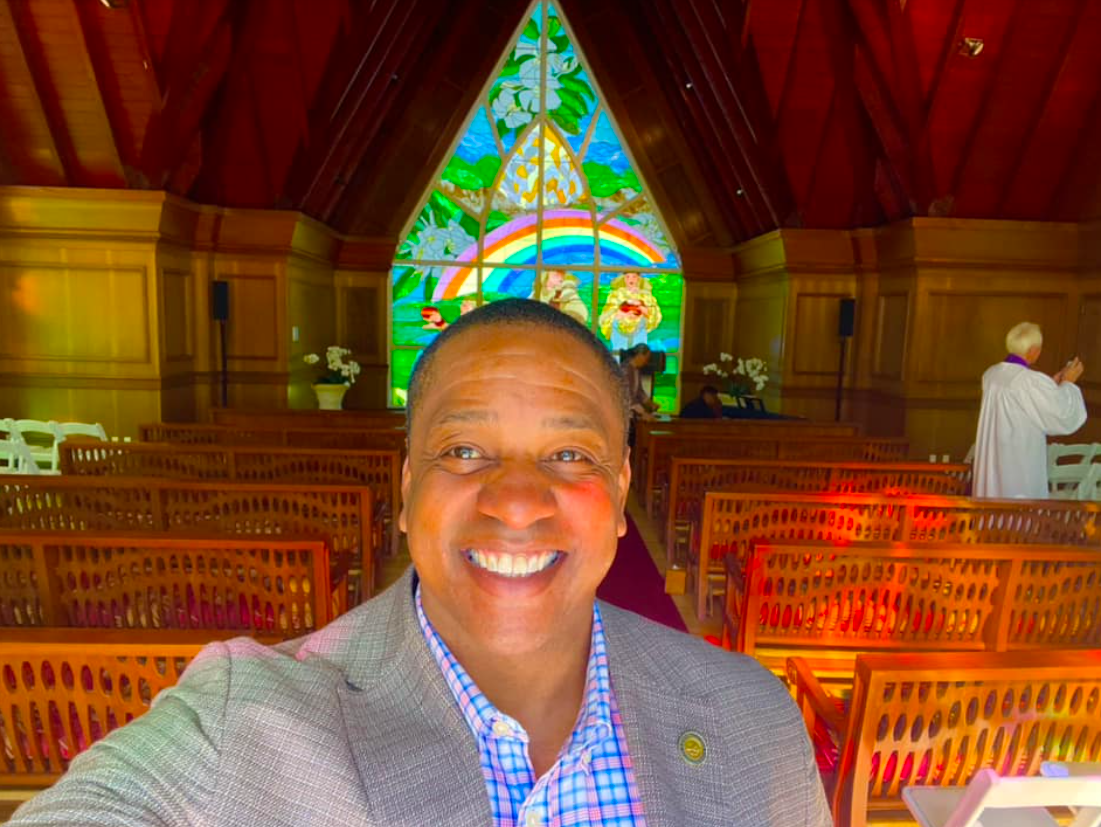 Justin Fairfax poses for a photo inside a church during a visit to Hawaii, as posted in April 2023 | Source: Facebook/justin.fairfax.2025