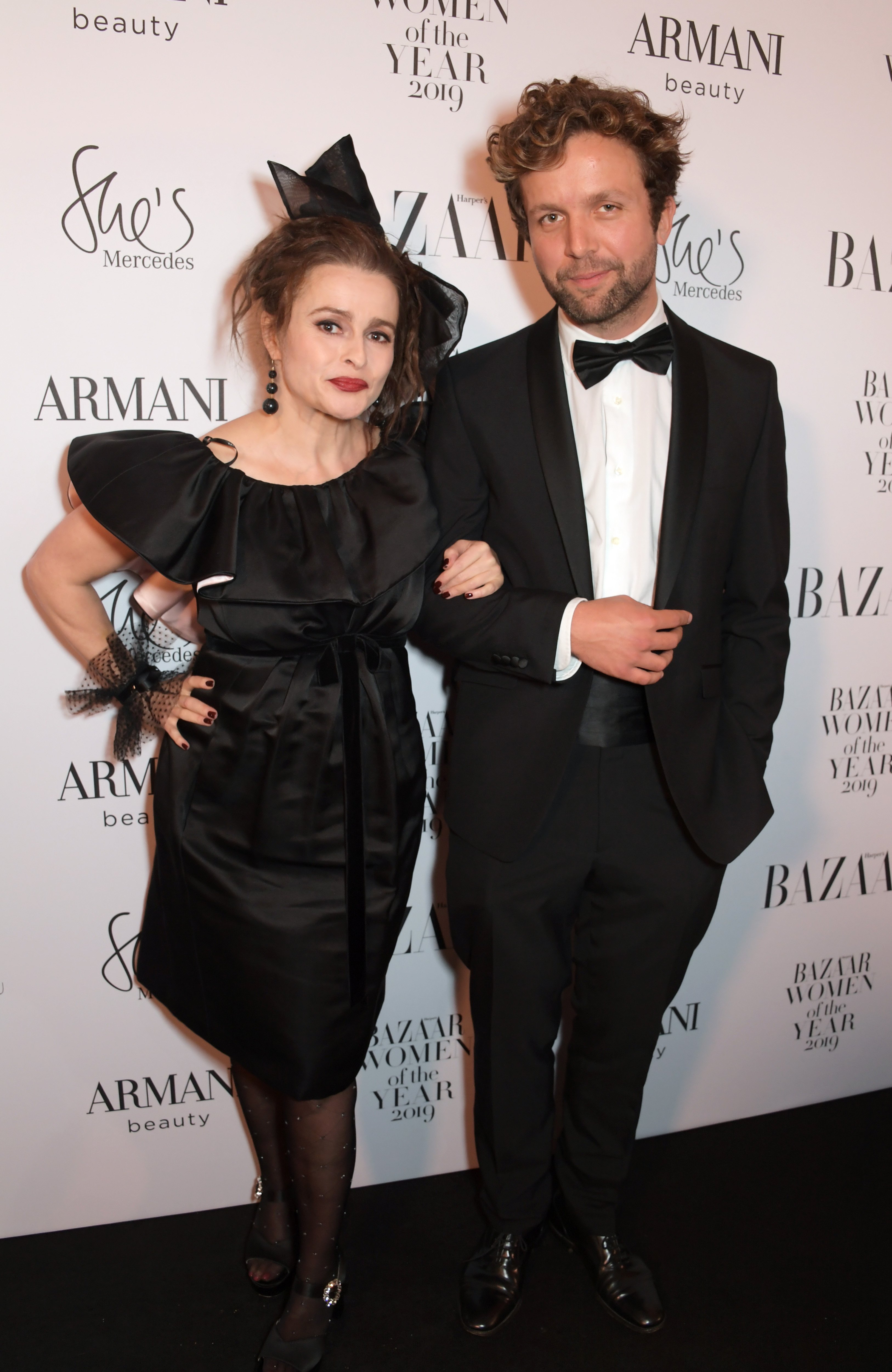 Helena Bonham Carter and Rye Dag Holmboe attend the Harper's Bazaar Women of the Year Awards 2019 at Claridge's Hotel on October 29, 2019 in London, England. | Source: Getty Images