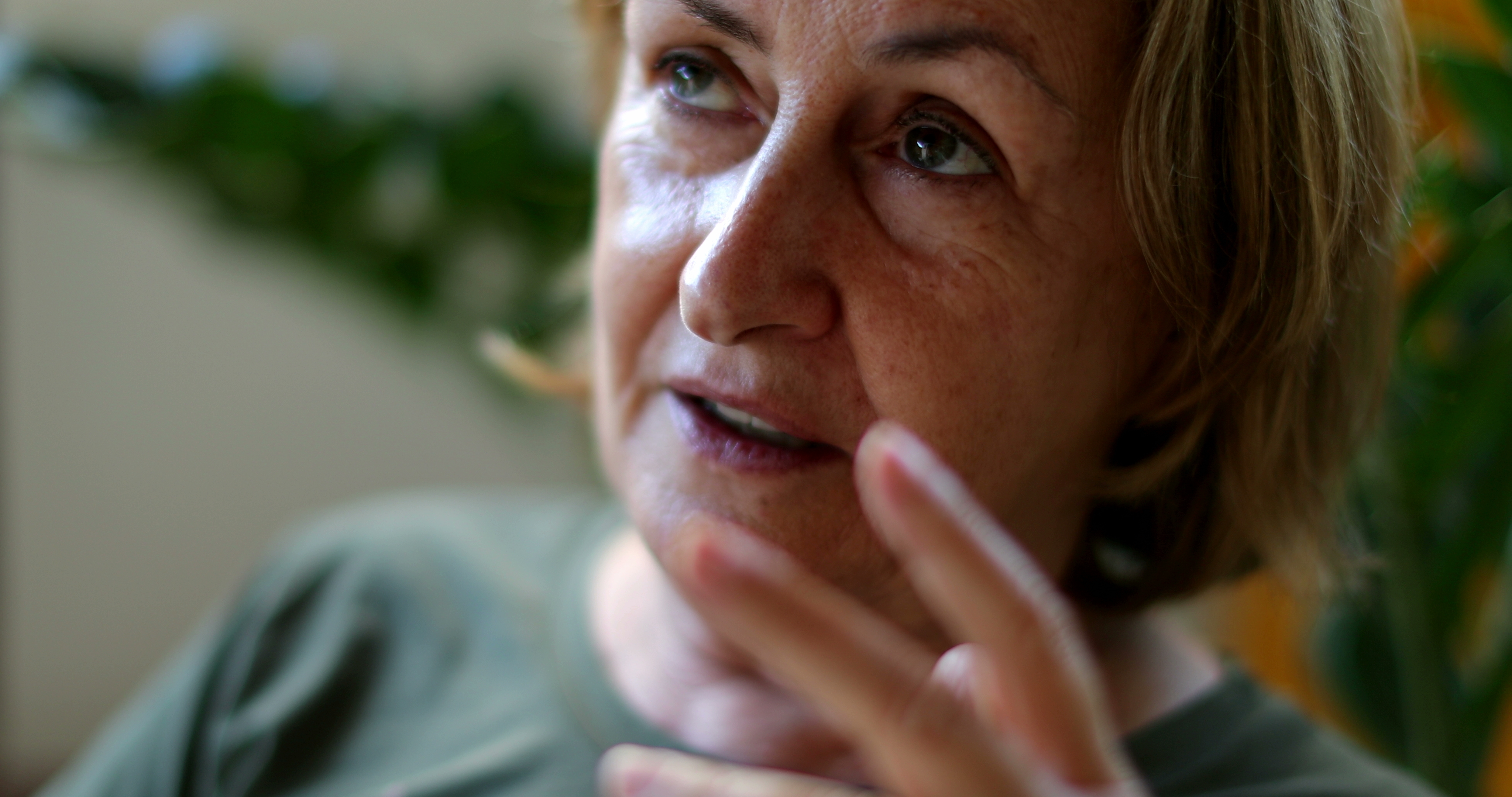 A woman talking to someone | Source: Shutterstock