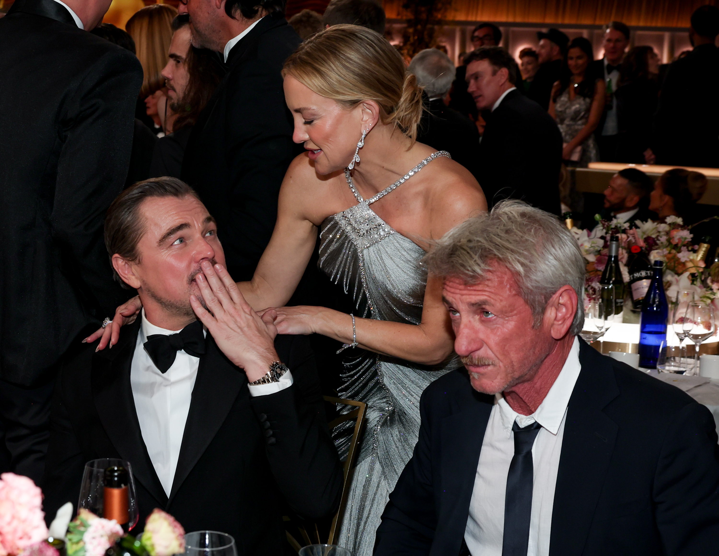 Leonardo DiCaprio, Kate Hudson, and Sean Penn share a moment at the 83rd Annual Golden Globe Awards on January 11, 2026 | Source: Getty Images