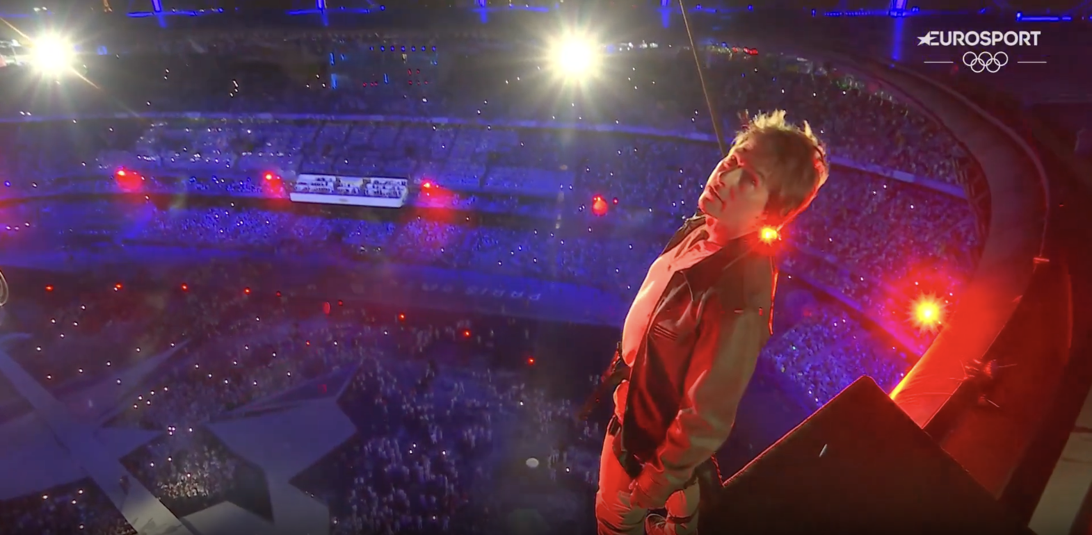 Tom Cruise gearing up to leap of the stadium's roof during the closing ceremony of the Paris Olympics, posted on August 12, 2024 | Source: YouTube/Eurosport