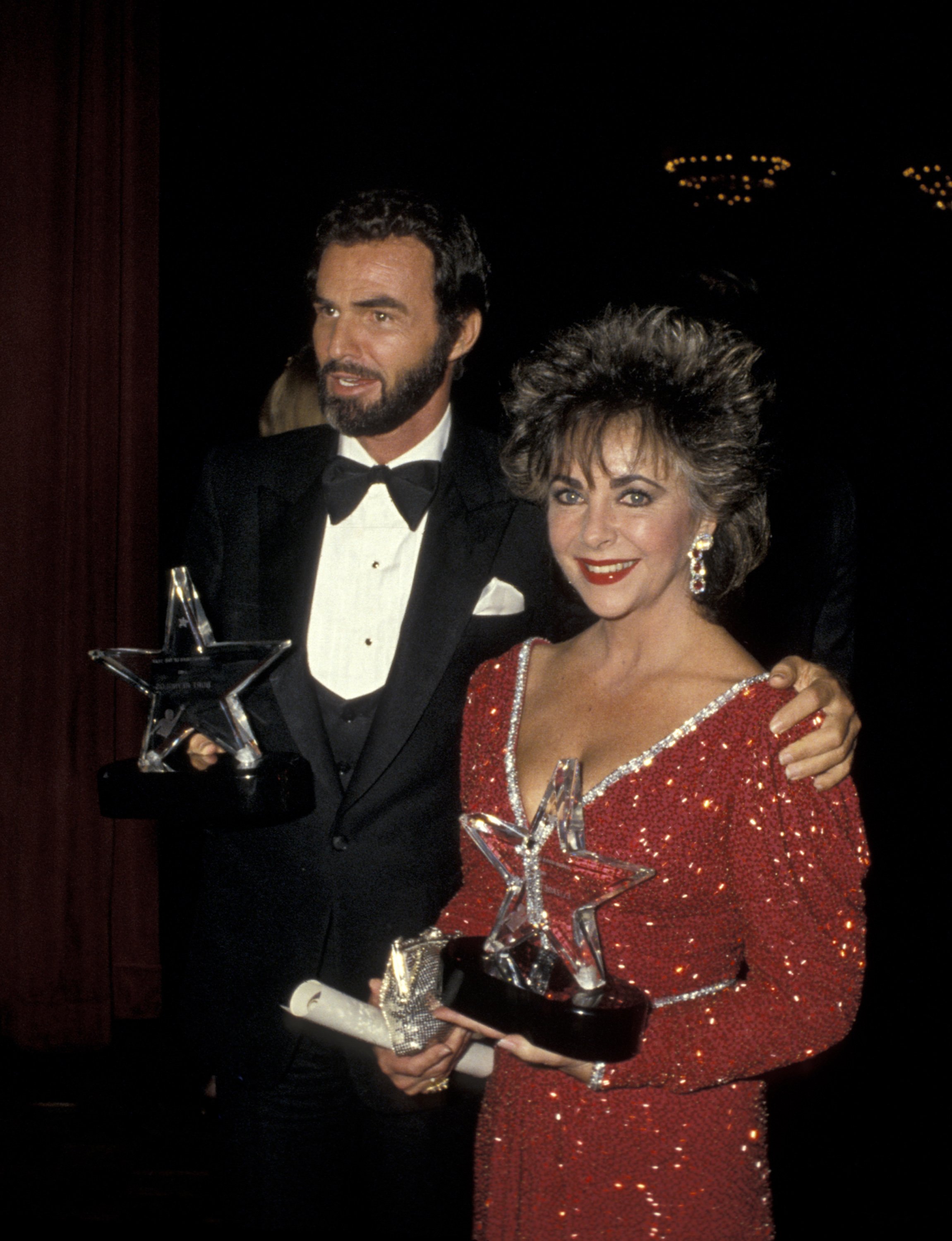 Burt Reynolds and Elizabeth Taylor during Second Annual Starlight Foundation Benefit Gala at The Plaza Hotel in New York City, New York, United States. | Source: Getty Images