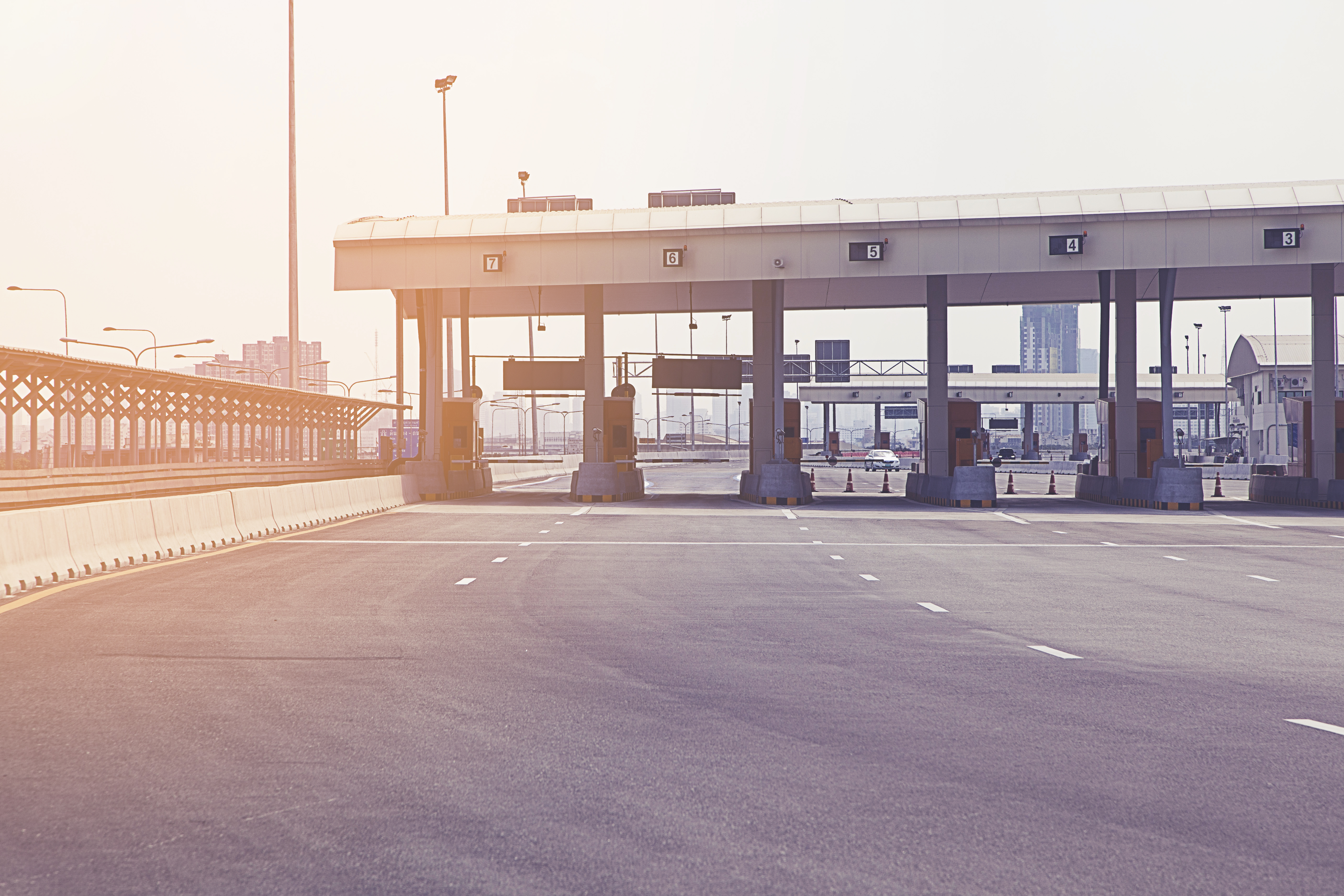 Tollbooths on a wide road | Source: Shutterstock