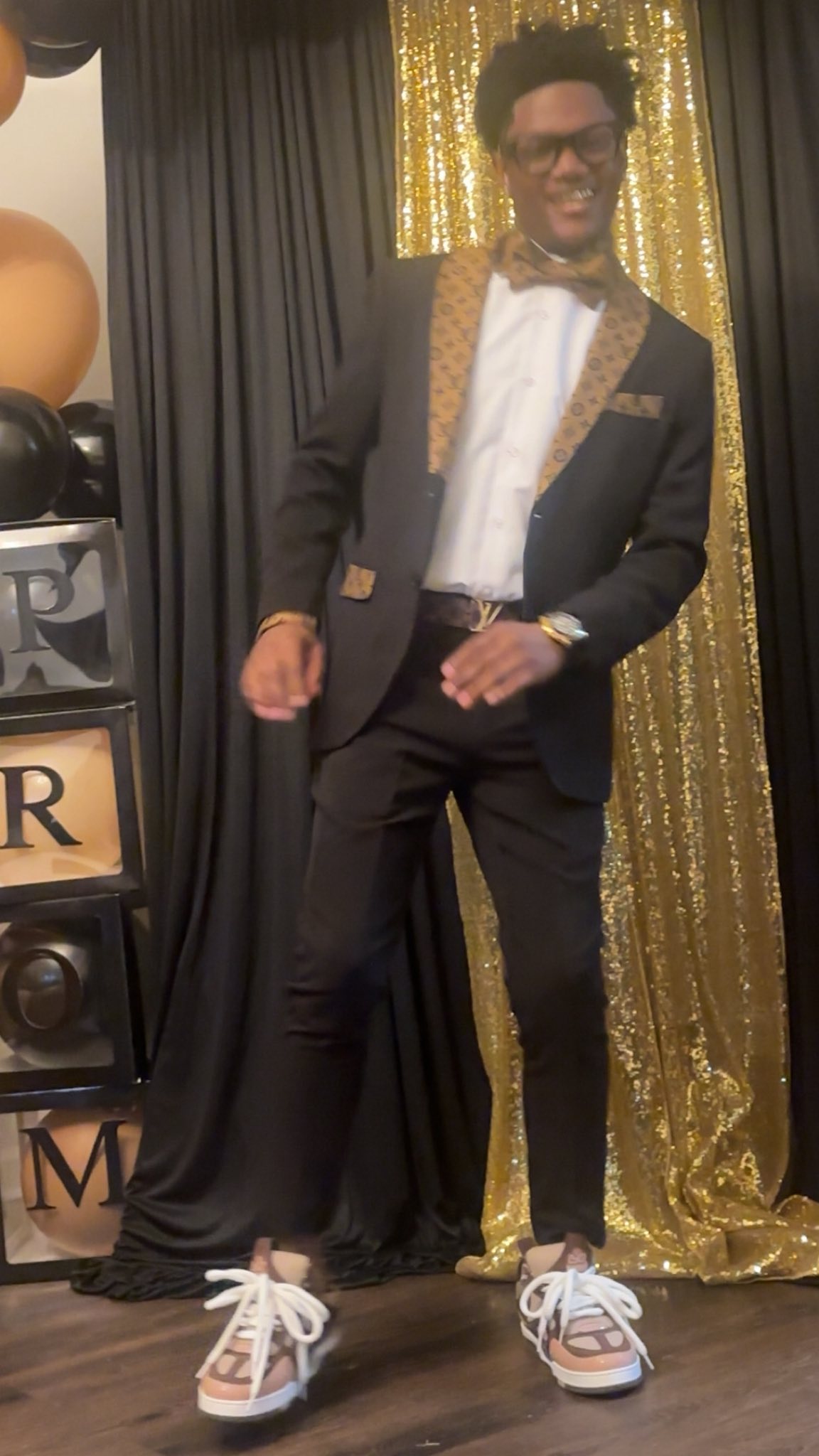 Ladainian Cathey posing for photos on his Prom day, posted on April 19, 2026. | Source: Facebook/Lakeisha Johnson