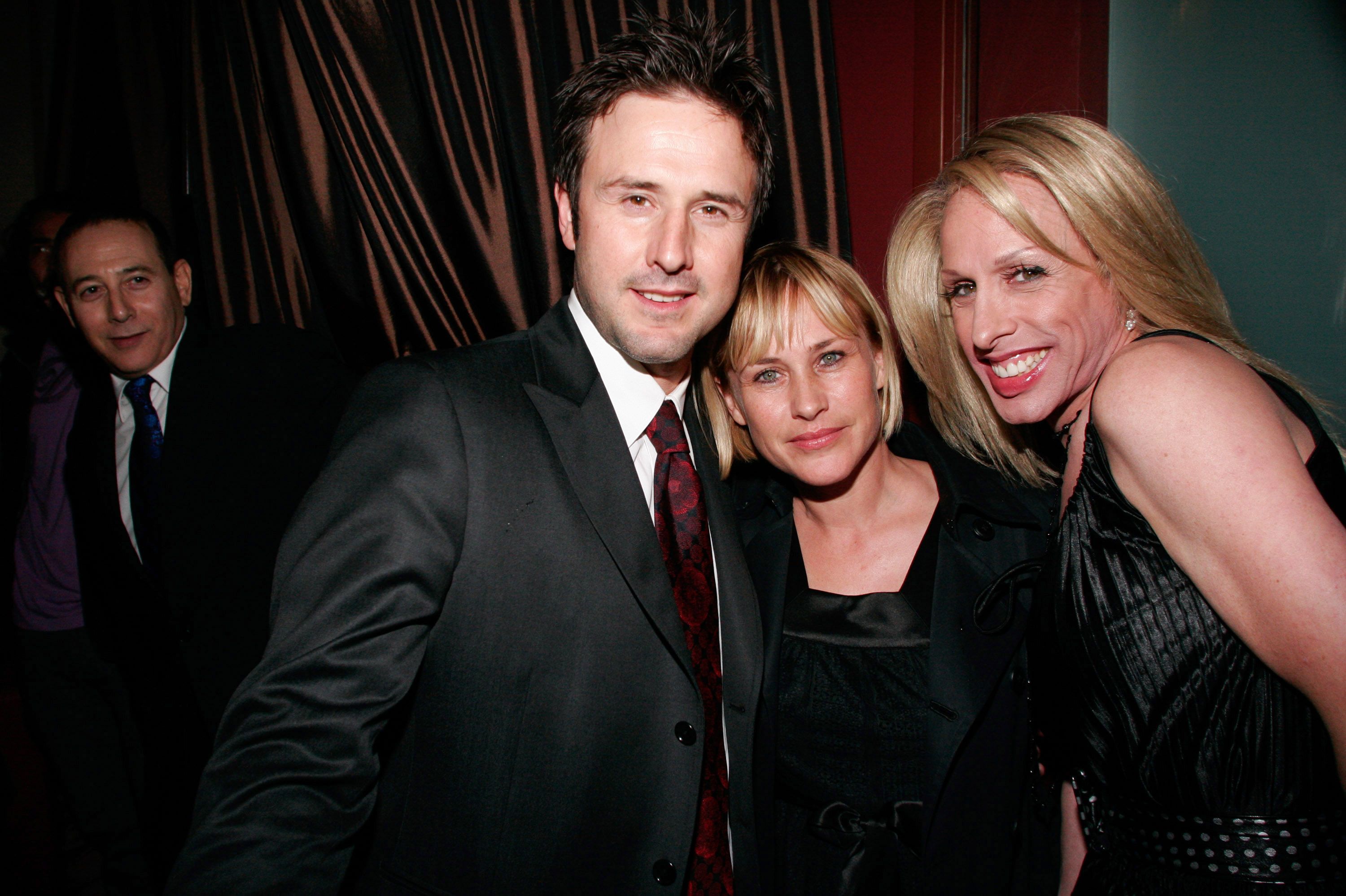 Alexis Arquette with siblings David Arquette, and Patricia Arquette | Source: Getty Images