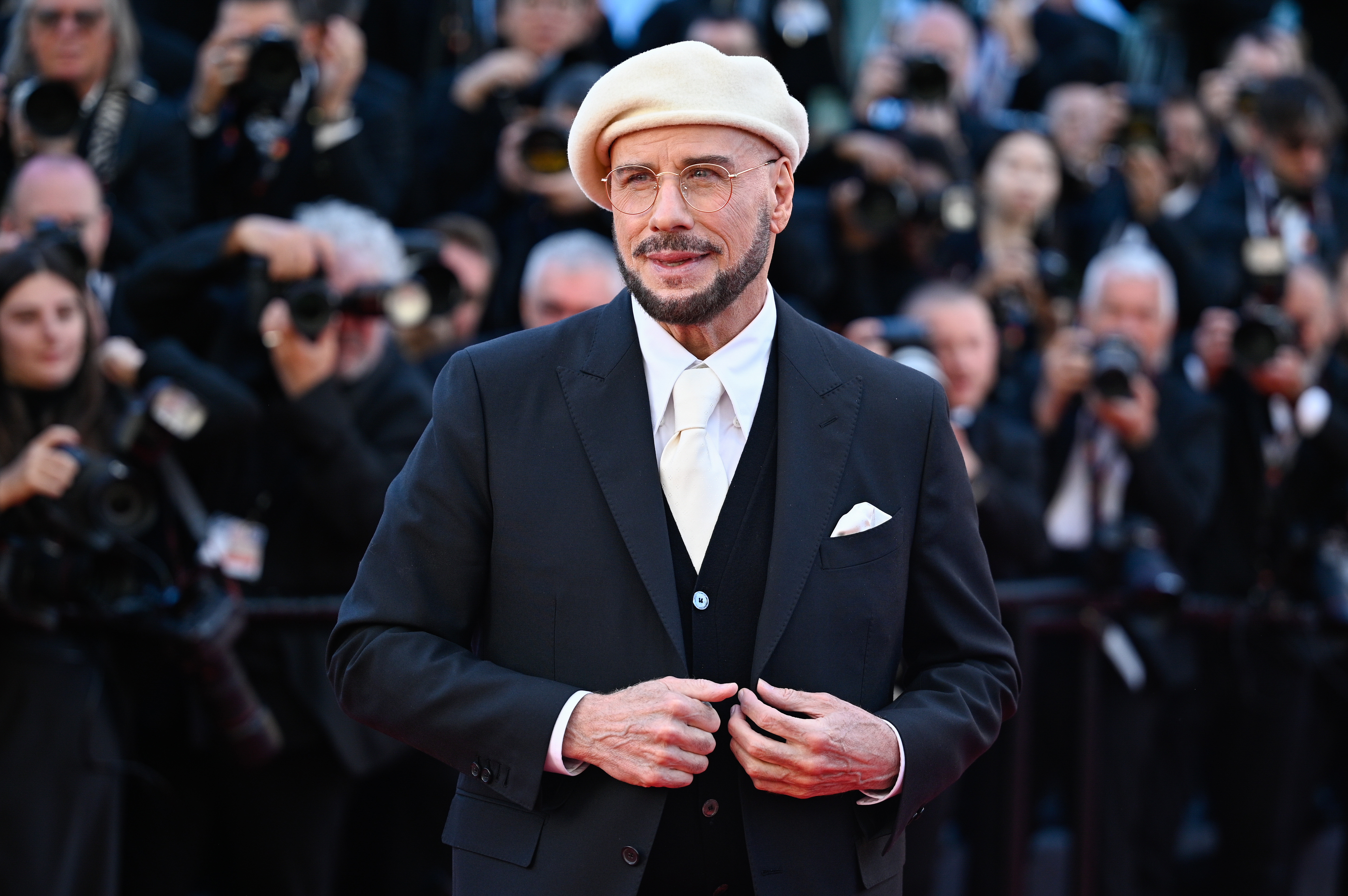 John Travolta attends the "Karma" screening during the 79th annual Cannes Film Festival at Palais des Festivals on May 15, 2026 in Cannes, France. | Source: Getty Images