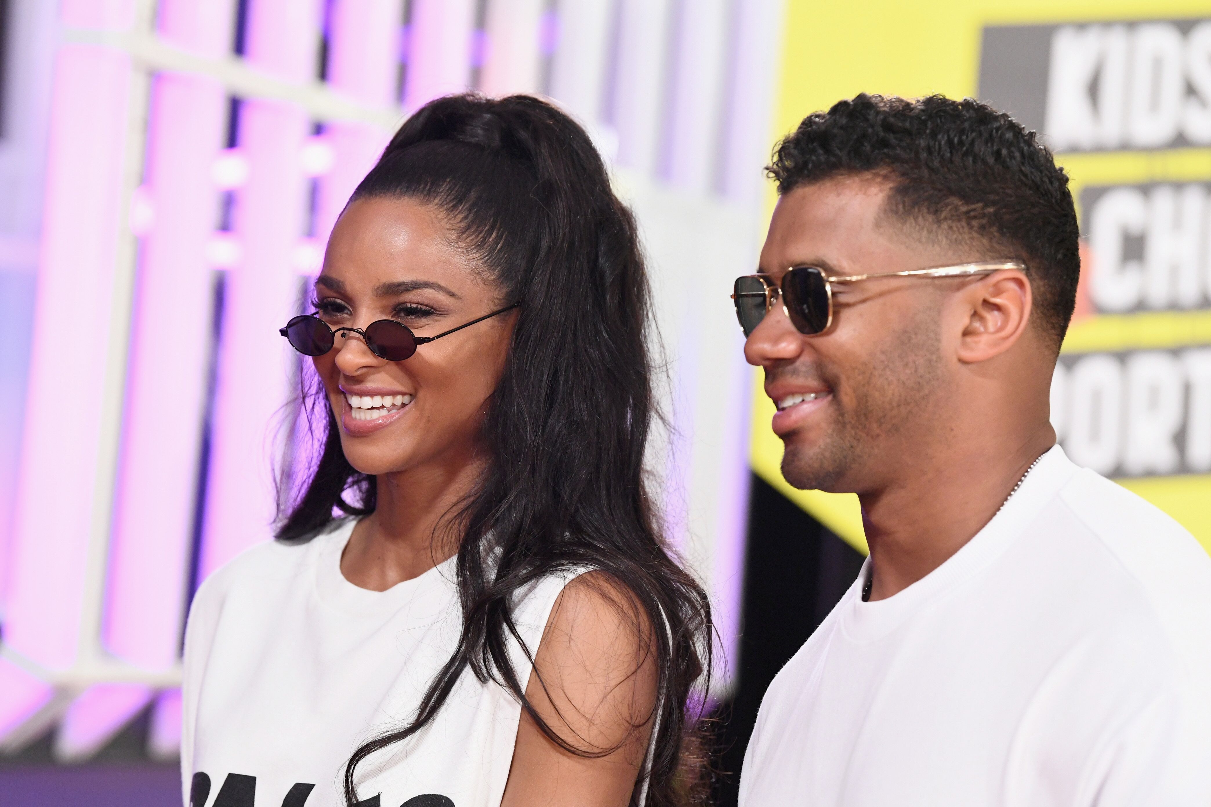 Ciara (L) and NFL player Russell Wilson attend the Nickelodeon Kids' Choice Sports 2018 at Barker Hangar | Photo: Getty Images