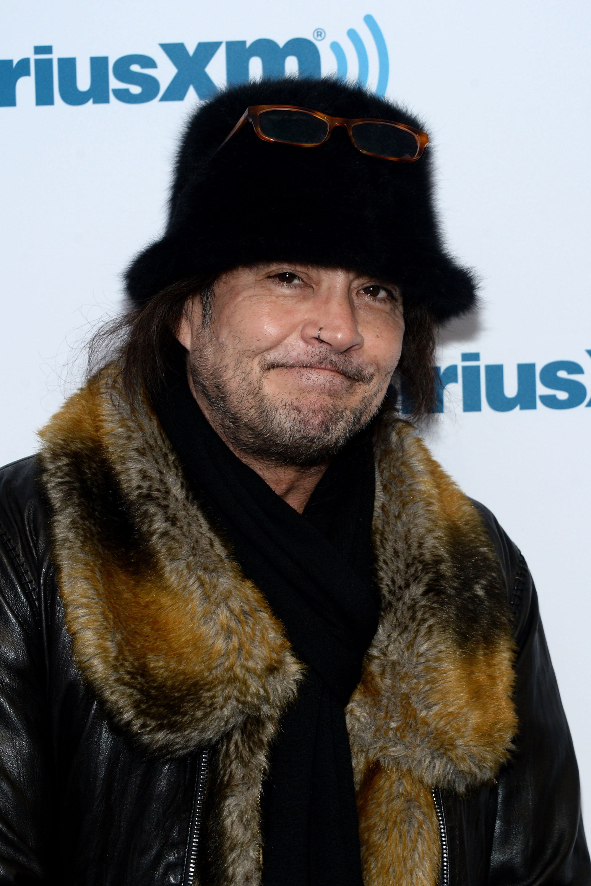 Jake E. Lee visits SiriusXM Studios on December 1, 2014, in New York City. | Source: Getty Images