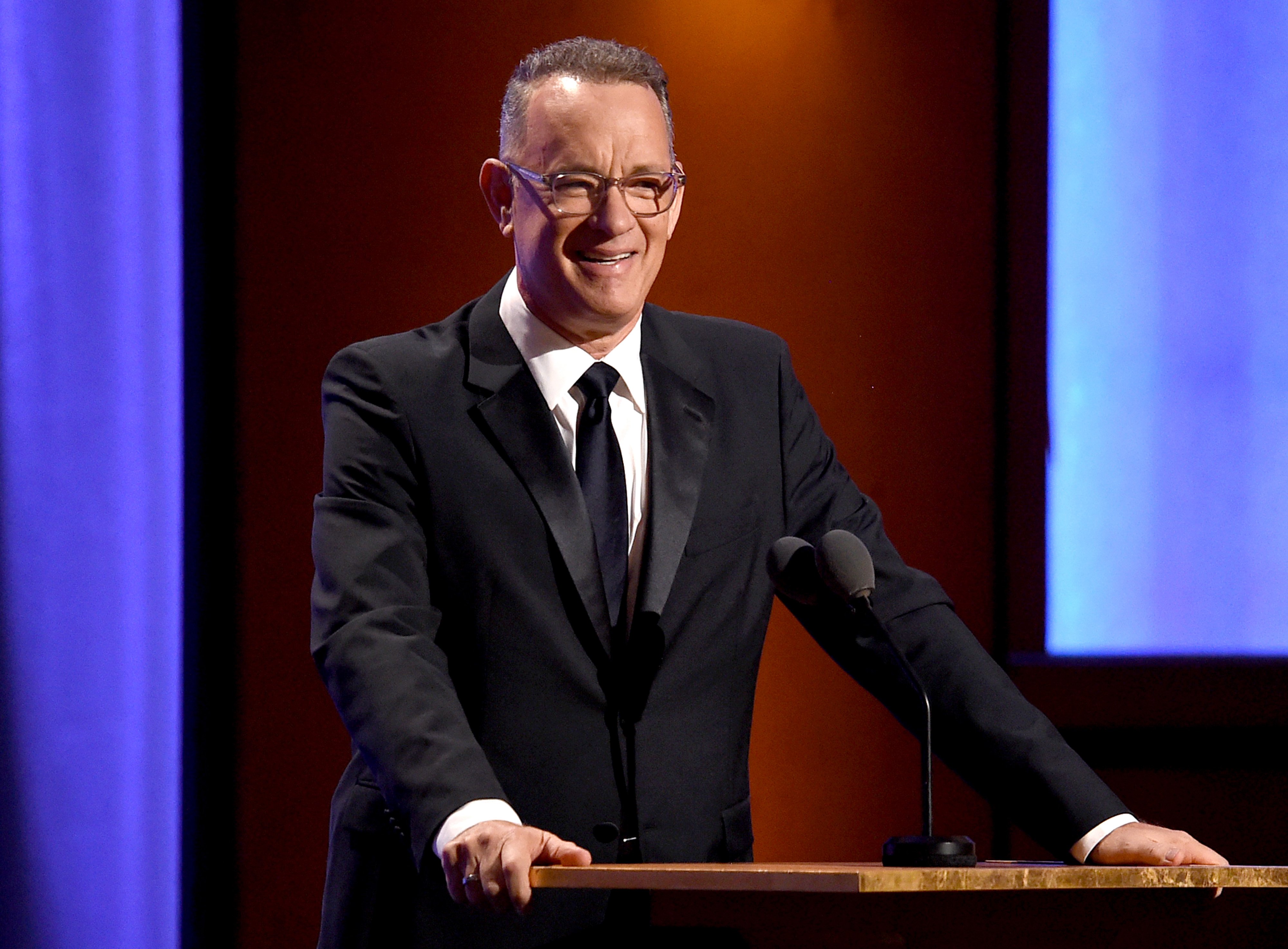 Tom Hanks speaking onstage during the Academy of Motion Picture Arts and Sciences' 10th annual Governors Awards at The Ray Dolby Ballroom at Hollywood & Highland Center in Hollywood, California | Photo: Kevin Winter/Getty Images