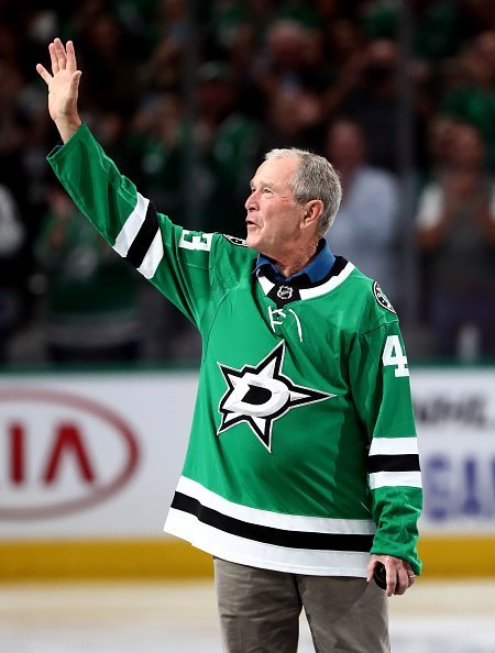  Former President George W. Bush walks on the ice before a game between the Boston Bruins and the Dallas Stars at American Airlines Center on October 03, 2019 in Dallas, Texas | Photo: Getty Images