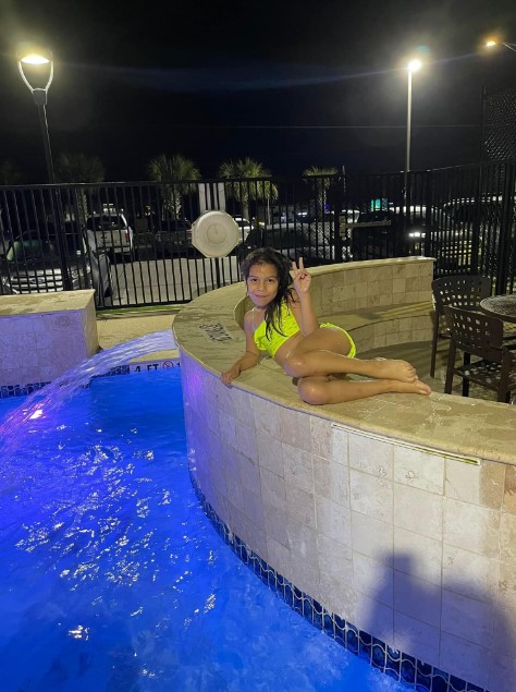 Aliyah Jaico posing for a poolside picture | Source: Facebook/Daniela Jaico
